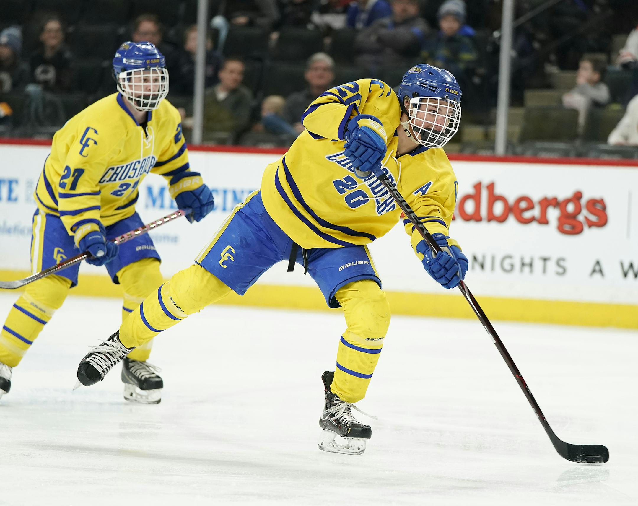 St. Cloud Cathedral forward Jack Smith (20) shoots and scores a goal during the first period. ] LEILA NAVIDI &#xa5; leila.navidi@startribune.com BACKGROUND INFORMATION: St. Cloud Cathedral plays against East Grand Forks in a Class 1A boys' hockey semifinal game at the Xcel Energy Center in St. Paul on Friday, March 8, 2019.