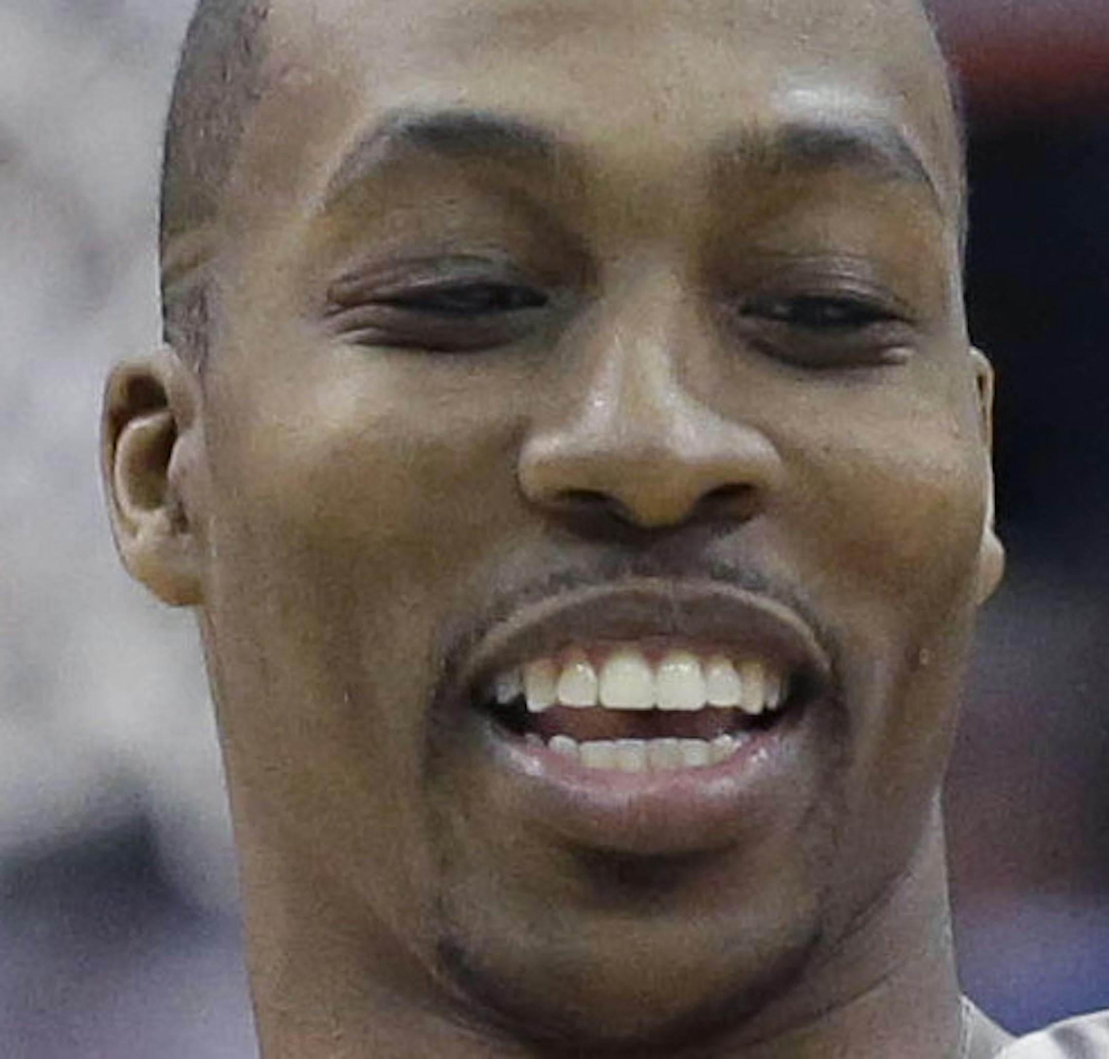 Houston Rockets center Dwight Howard (12) greets Dallas Mavericks shooting guard Monta Ellis (11) before the start of their NBA basketball game Wednesday, Jan. 29, 2014, in Dallas. (AP Photo/LM Otero) ORG XMIT: MIN2014020720443626