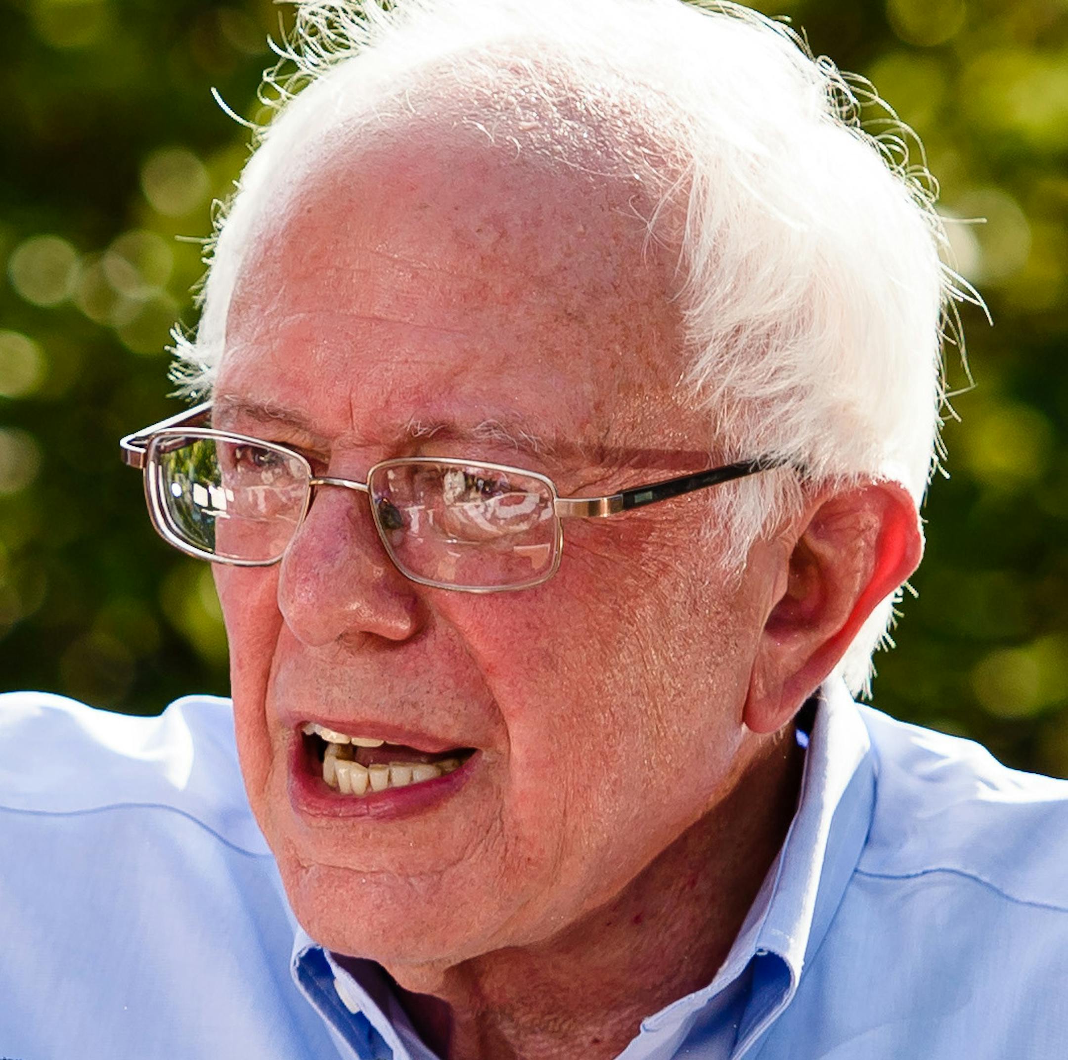 Bernie Sanders urges a crowd to support Hillary Clinton at Lebanon High School in Lebanon, N.H., Sept. 5, 2016. Despite his urging, many of his former supporters are refusing to accept the idea that they should vote for Clinton to keep Donald Trump out of the White House. (Jacob Hannah/The New York Times)
