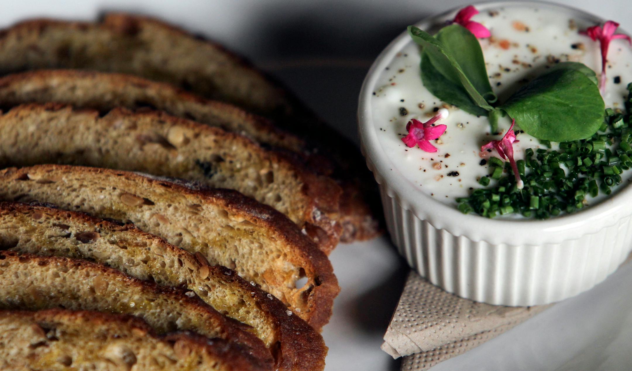 <b>Lightened up </b>
<p class="noteText">In a year when the words "small plates" became deeply embedded into the local dining-out vocabulary, one that definitely rose to the top was the sweet pea "p&acirc;t&eacute;" at <b>Birdhouse</b>, Stewart and Heidi Woodman's healthy-eating version of the all-day diner. As warm-weather snacks go, it was as ingenious as it was delicious, a delicate swirl of pur&eacute;ed peas enhanced with ch&egrave;vre, cr&egrave;me fra&icirc;c