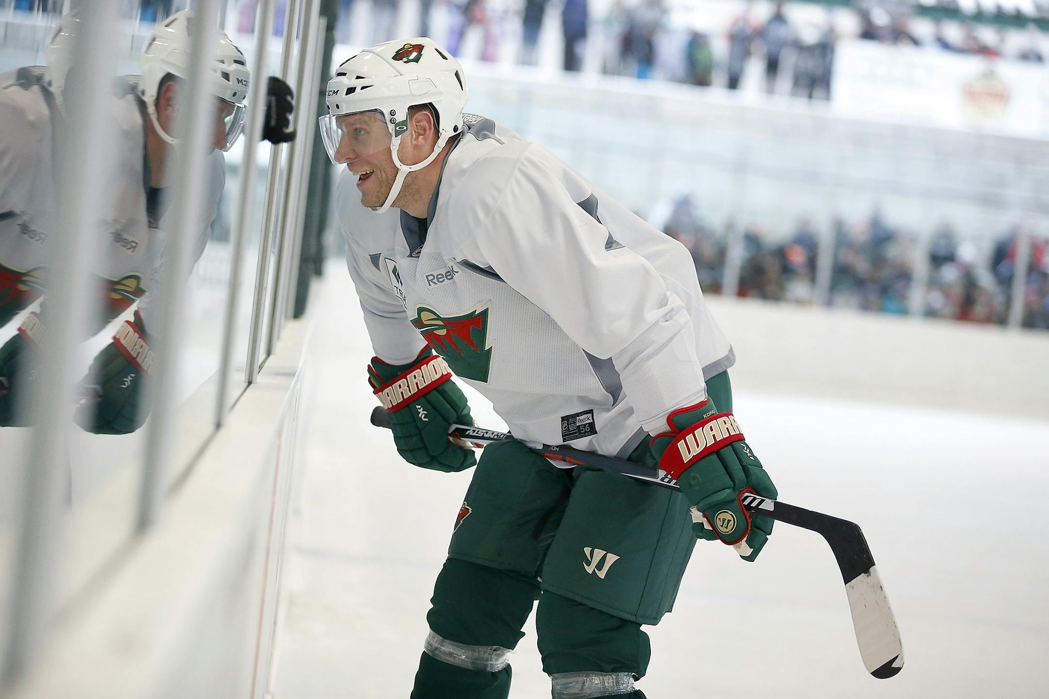 Minnesota Wild's Mikko Koivu greeted kids from the ice during an open outdoor Wild practice at the Backyard Outdoor Ice Rink at Braemar Arena, Monday, January 2, 2017 in Edina, MN.