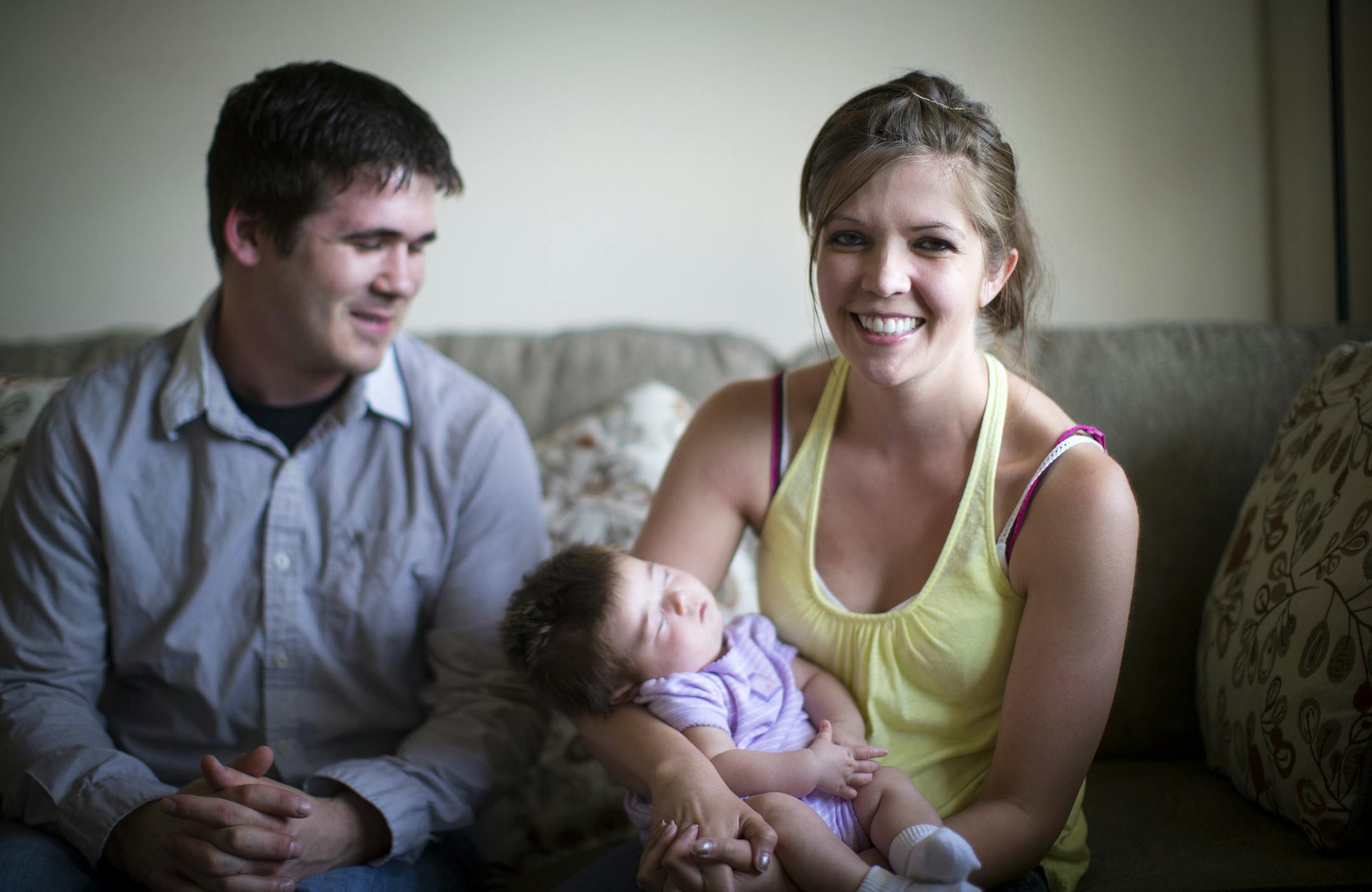 Rita Erickson was nearly a celebrity by the age of two for an unfortunate reason: her liver was failing and she needed a transplant. Then that liver failed, too, and news outlets picked up her story and the public efforts to find her another liver. The second transplant worked and she faded out of the spotlight and resumed her life. Thirty years later, Erickson lives in Elk River with her fiancÈ and has a new baby. Rita and her fiancÈ John Fink were photographed with daughter Theresa o