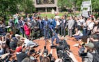 Attorney Ben Crump, outside the Hennepin County Government Center with the Rev. Al Sharpton and members of George Floyd’s family in May, called on C