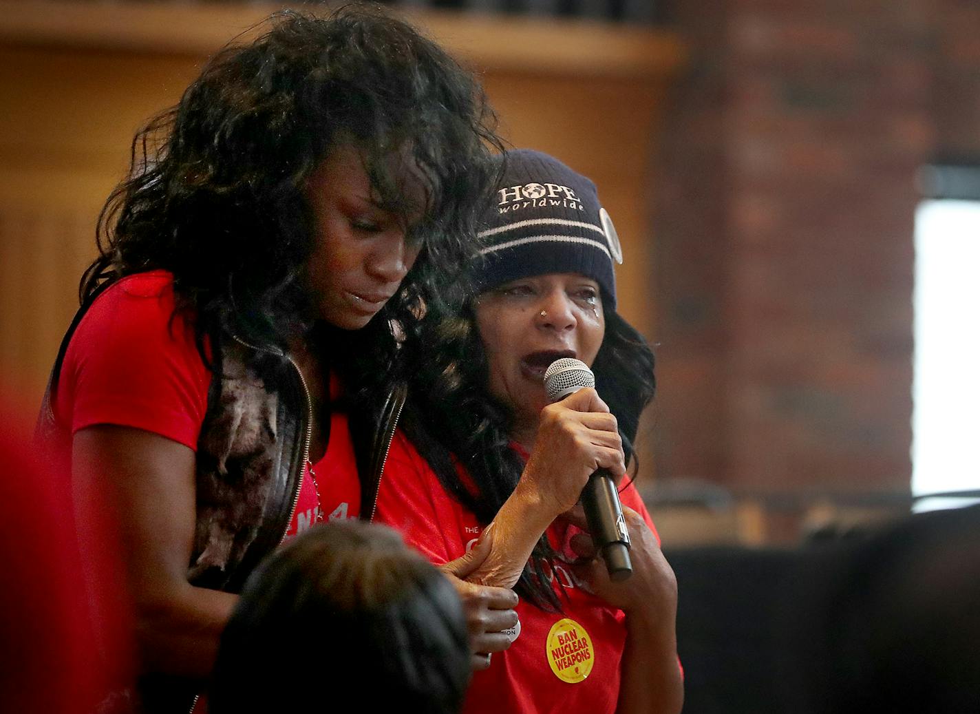 Here, Hope Coleman of Boston, MA, whose son Terrance was shot and killed by police in 2016, tells those gathered about the pain of losing her son while Chantel Brooks, left, whose son Michael Wesley was killed by police in 2013 comforts her during the Take A Knee Nation conference at Foss Center at Augsburg University Saturday, Feb. 3, 2018, in Minneapolis, MN. "I'm suffering in pain," Coleman said. "I lost 80 pounds."] DAVID JOLES &#xef; david.joles@startribune.com Take A Knee Nation, a two-day