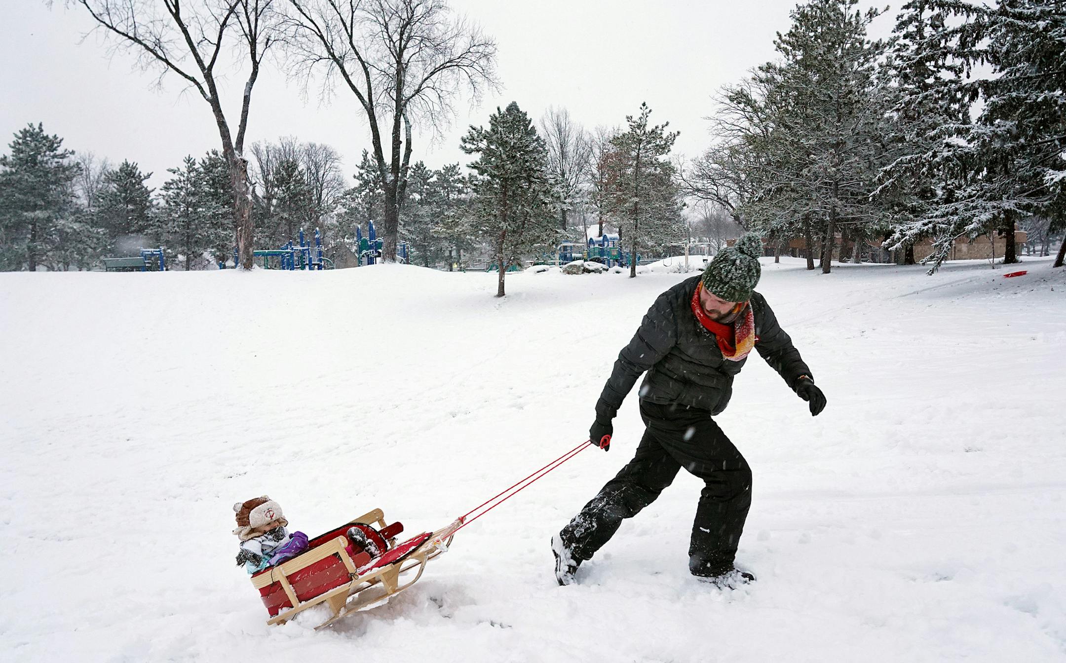 Jared Roddy and his son, Frank, 2, used the sudden snowstorm to go sledding Saturday, Dec. 1, 2018 at Audubon Park in Northeast Minneapolis. The storm dumped between 2 and 4 inches of snow on the Twin Cities with several more inches seen across much of the state. ] ANTHONY SOUFFLE ï anthony.souffle@startribune.com Jared Roddy and his son, Frank, 2, used the sudden snowstorm to go sledding Saturday, Dec. 1, 2018 at Audubon Park in Northeast Minneapolis. The storm dumped between 2 and 4 inche