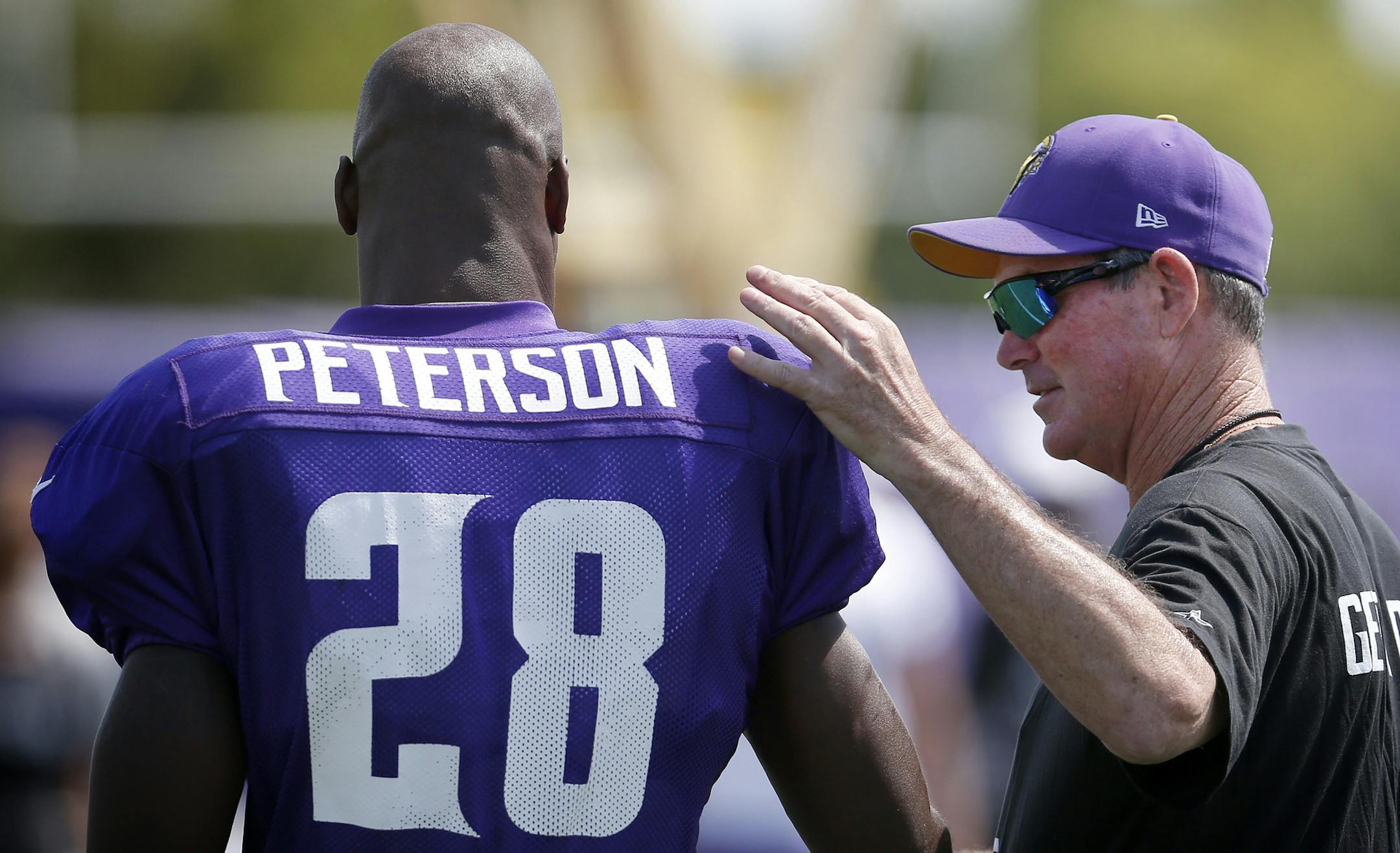 Before Adrian Peterson suffered a thigh injury in Tuesday’s practice, coach Mike Zimmer talked with his star running back.
