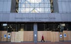 Boarded-up doors and windows outside the Hennepin County Government Center in downtown Minneapolis. Monday, Nov. 2, 2020, amid worries about the poten