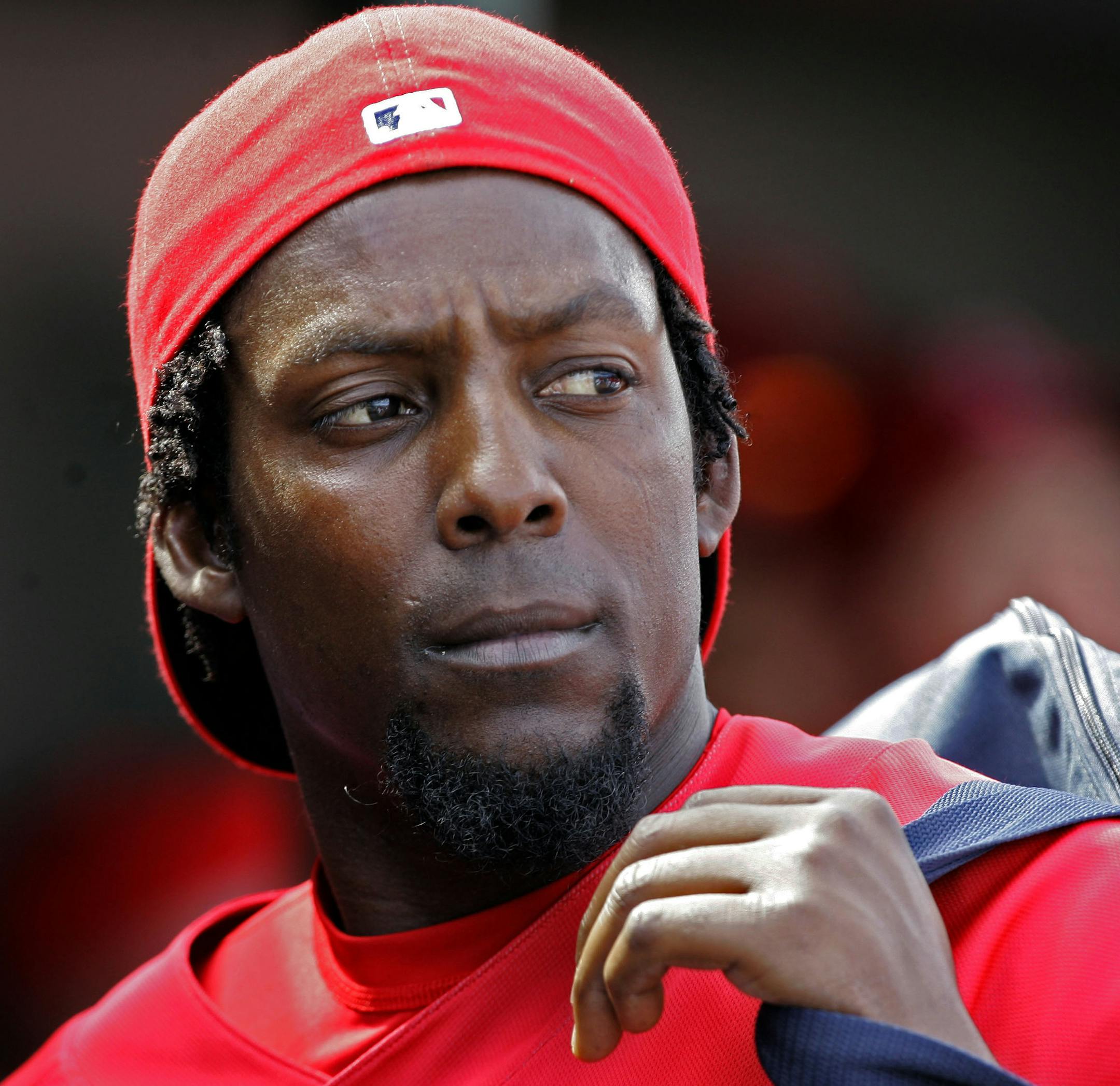 Los Angeles Angels' Vladimir Guerrero leaves a spring training baseball game against the Seattle Mariners in the fourth inning, when most of the Angels starters were done, Saturday, March 10, 2007, in Tempe, Ariz. (AP Photo/Chris Carlson) ORG XMIT: AZCC109