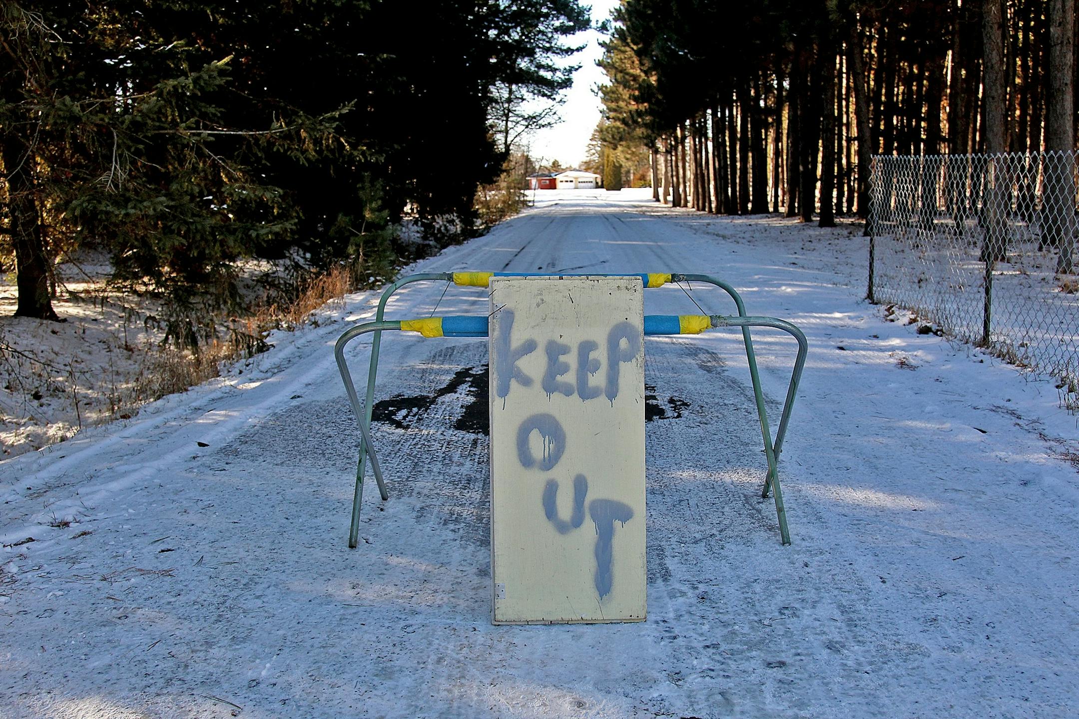A keep out sign kept onlookers from entering the property belonging to Byron David Smith, who was charged in Morrison County District Court with two counts of second-degree murder without premeditation in the killings of Nicholas Brady, 17, and his cousin Haile Kifer, 18. (ELIZABETH FLORES/STAR TRIBUNE) ELIZABETH FLORES � eflores@startribune.com