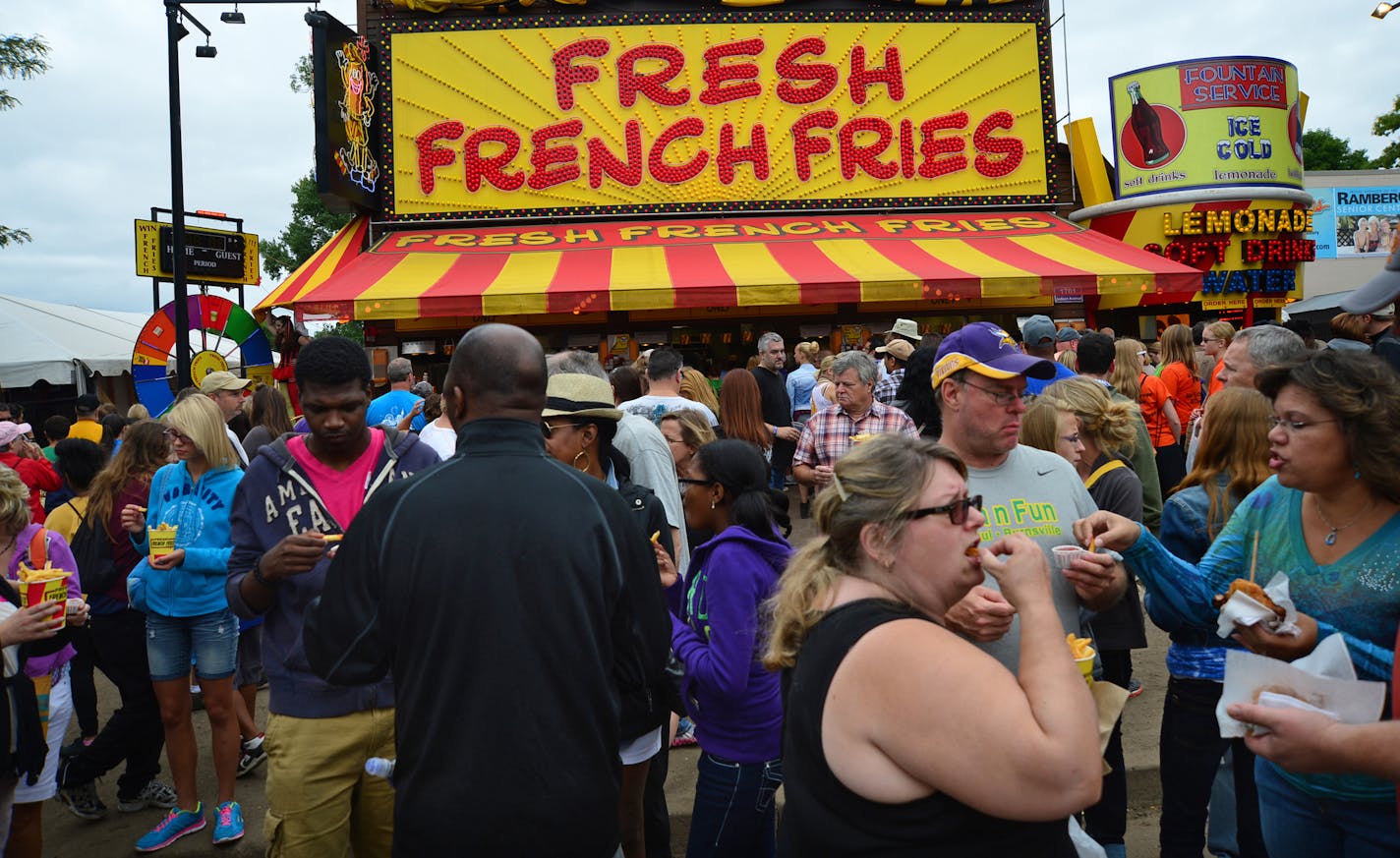 This French fries stand was mobbed around midday.