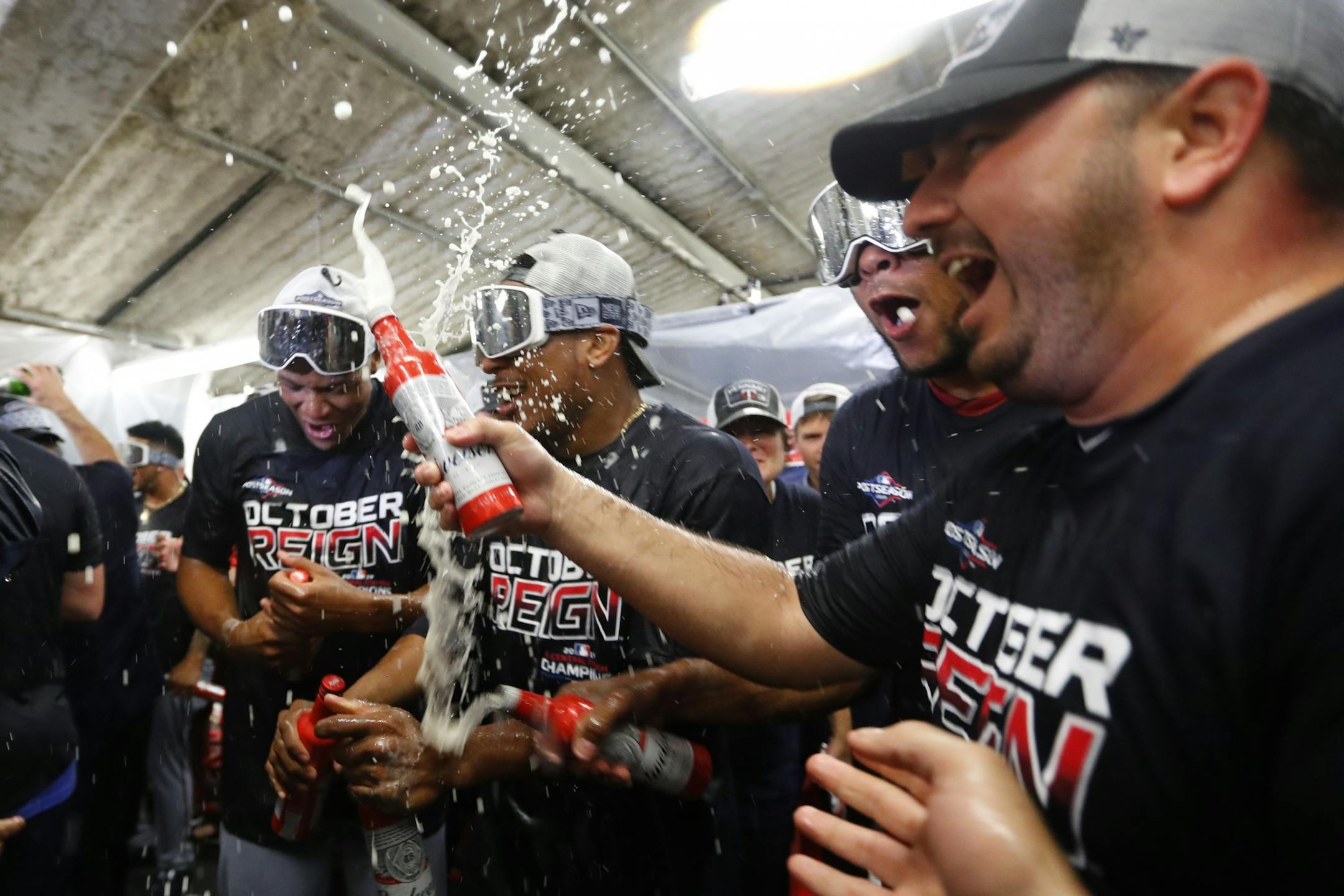 Minnesota Twins celebrate after the Twins clinched the AL Central, Wednesday, Sept. 25, 2019, in Detroit. The Twins defeated the Detroit Tigers 5-1, and later clinched when the Cleveland Indians lost to the Chicago White Sox.