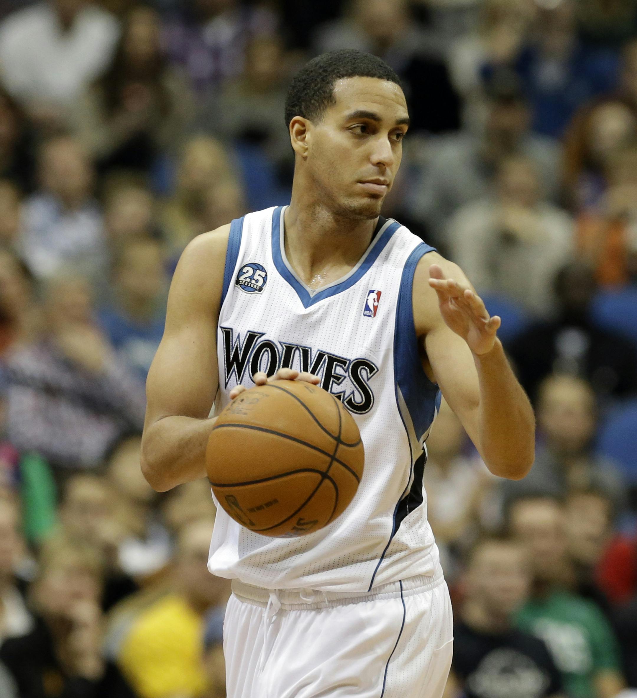 Minnesota Timberwolves' Kevin Martin heads down court in the second half of an NBA basketball game against the Dallas Mavericks, Friday, Nov. 8, 2013 in Minneapolis. The Timberwolves won 116-108. (AP Photo/Jim Mone) ORG XMIT: MIN2013110917162875
