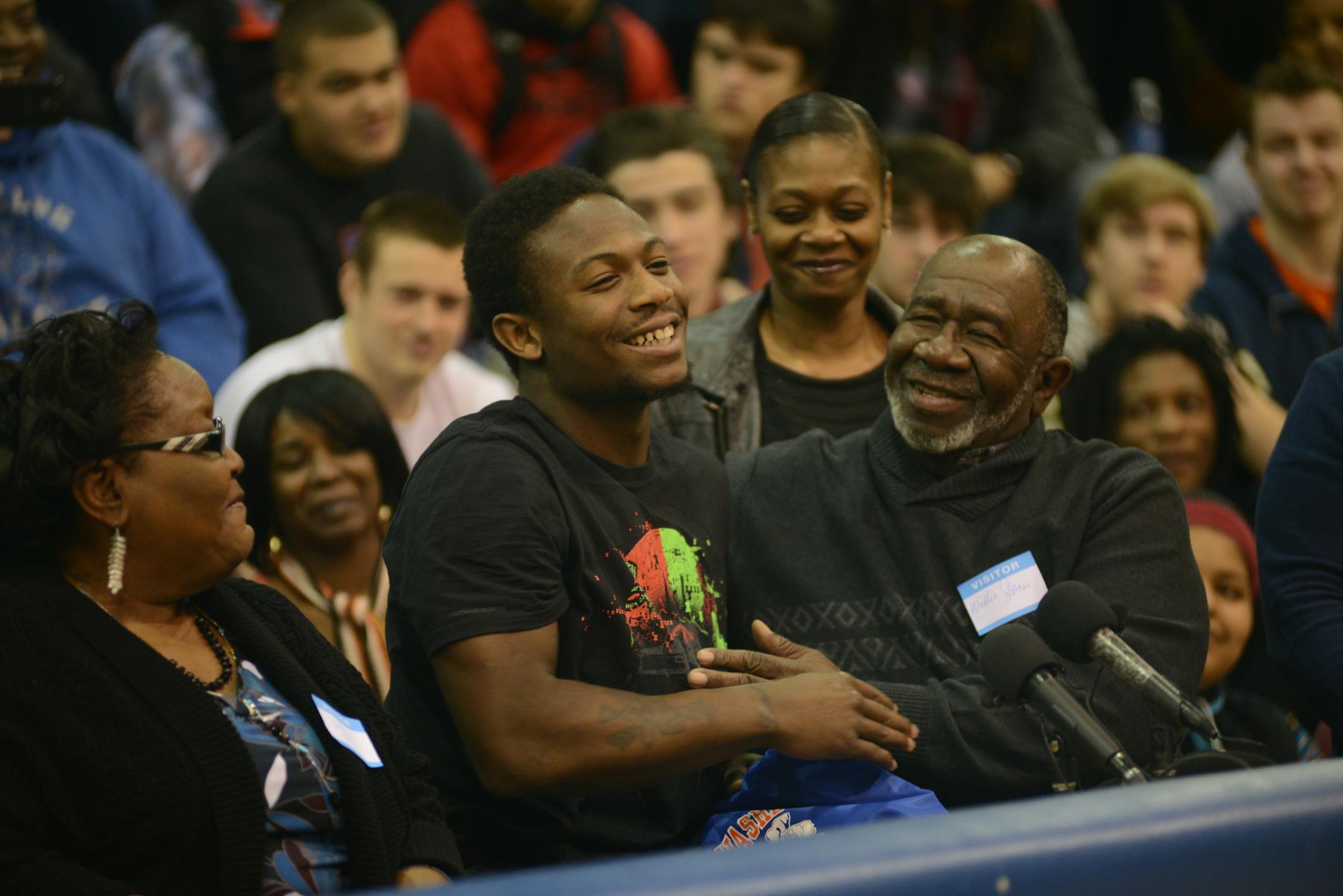 Jeff Jones, from Washburn High is one of the top running backs in the country and he selected the U of M football program. Jeff Jones was front and center with his grandmother Doris jones and grandfather Willie Jones looking on in a packed Washburn High gym. ] Richard.Sennott@startribune.com Richard Sennott/Star Tribune Minneapolis , Minn. Wednesday 2/5/2014) ** (cq)