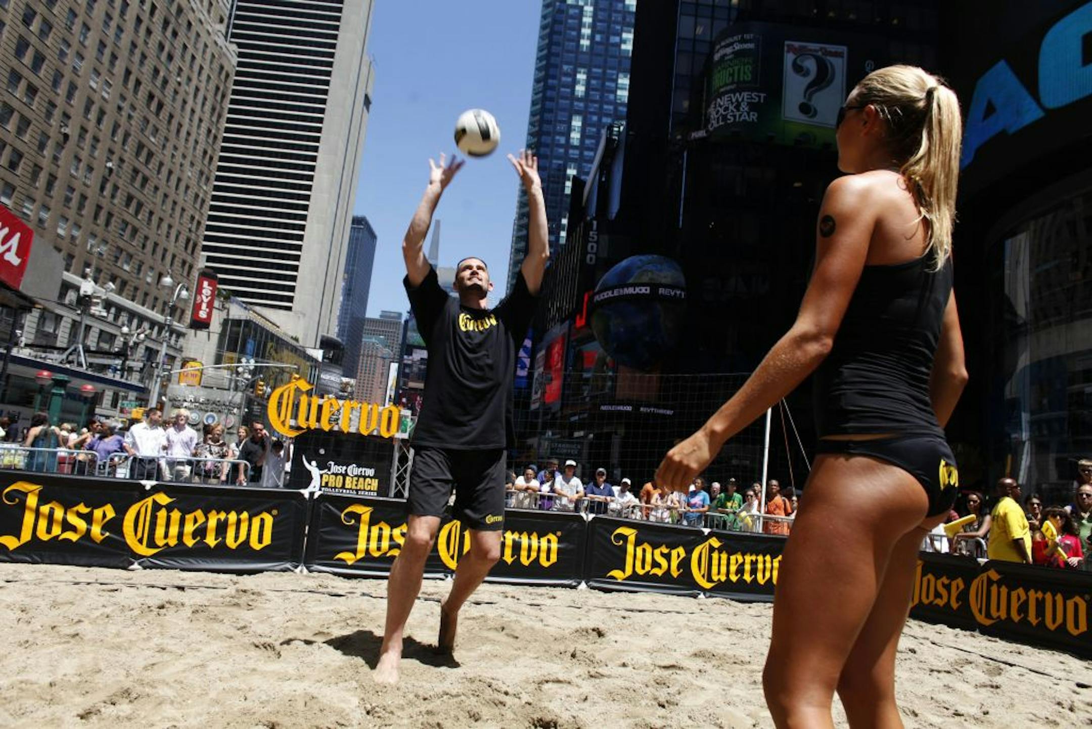 Kevin Love (left) on the sands of Times Square