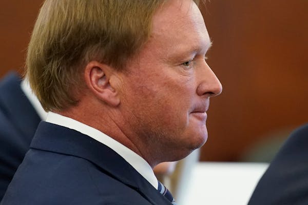 Jon Gruden listened in court in May 2022 as a judge heard a bid by the NFL to dismiss Gruden’s lawsuit accusing the league of a “malicious and orc