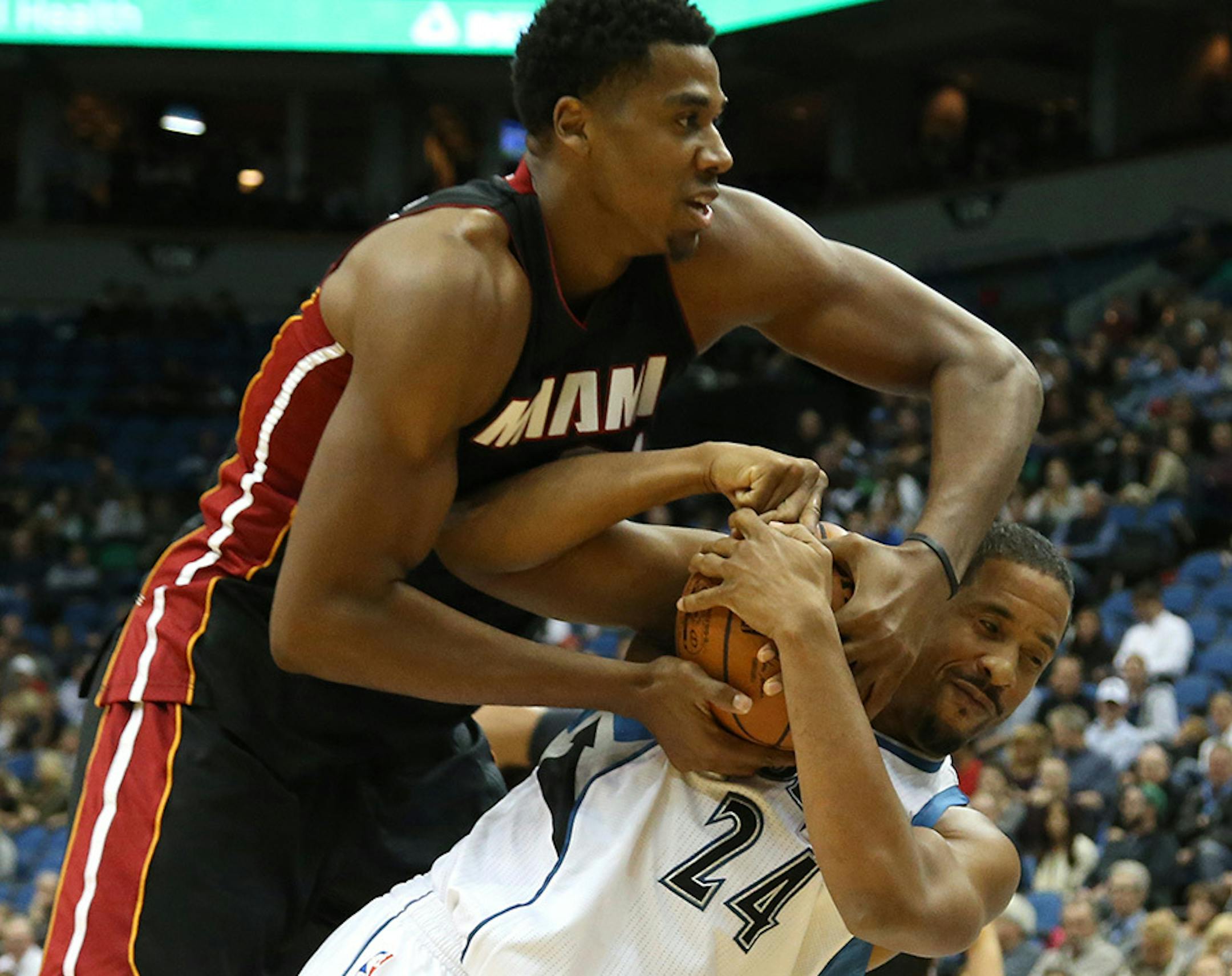 Miami's Hassan Whiteside fouled Wolves Andre Miller going for the ball during the second half at the Target Center in Minneapolis Min., Thursday November 5, 2015. Miami won over the Wolves 96-84.