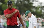 Tiger Woods reacts as he wins the Masters golf tournament Sunday, April 14, 2019, in Augusta, Ga. (AP Photo/Chris Carlson)