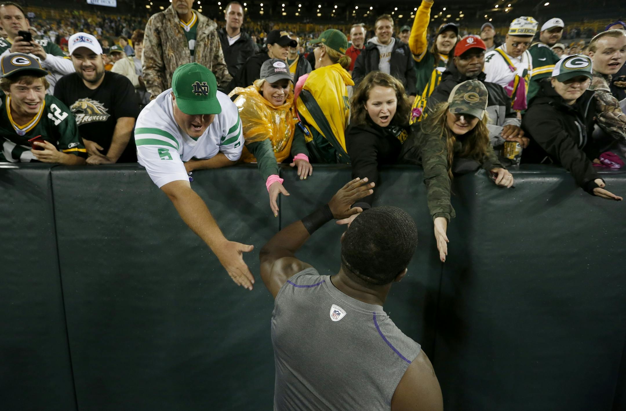 Minnesota Vikings receiver Greg Jennings was greeted by a fans at the end of the game.