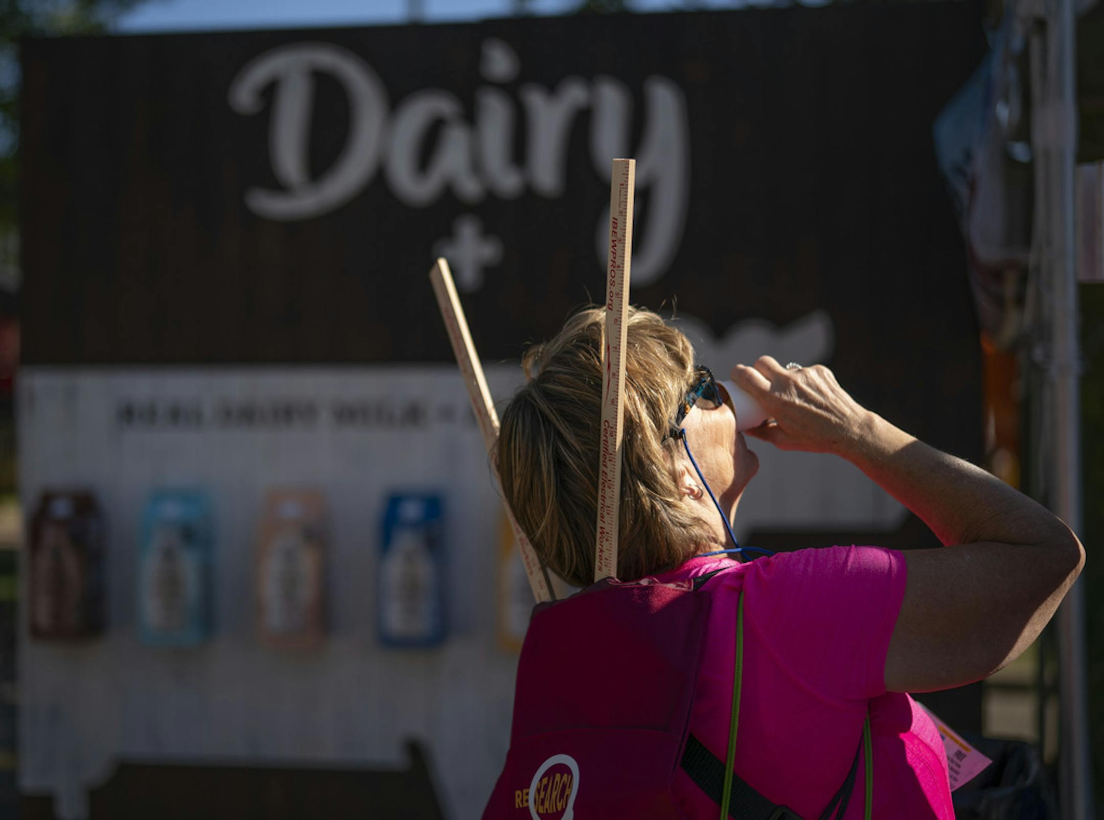Tammy Allison downed her sample of Live Real Farms' mild blend at the State Fair Wednesday afternoon. ] JEFF WHEELER • jeff.wheeler@startribune.com Live Real Farms, a 100% farmer owned producer of a first-ever blended milk product that includes both lactose free dairy and plant-based beverages like almond or oat milk is launching the product with free samples and coupons from their stand at the Minnesota State Fair in Falcon Heights. Tyler Hatley was pouring samples for fairgoers Wednesda