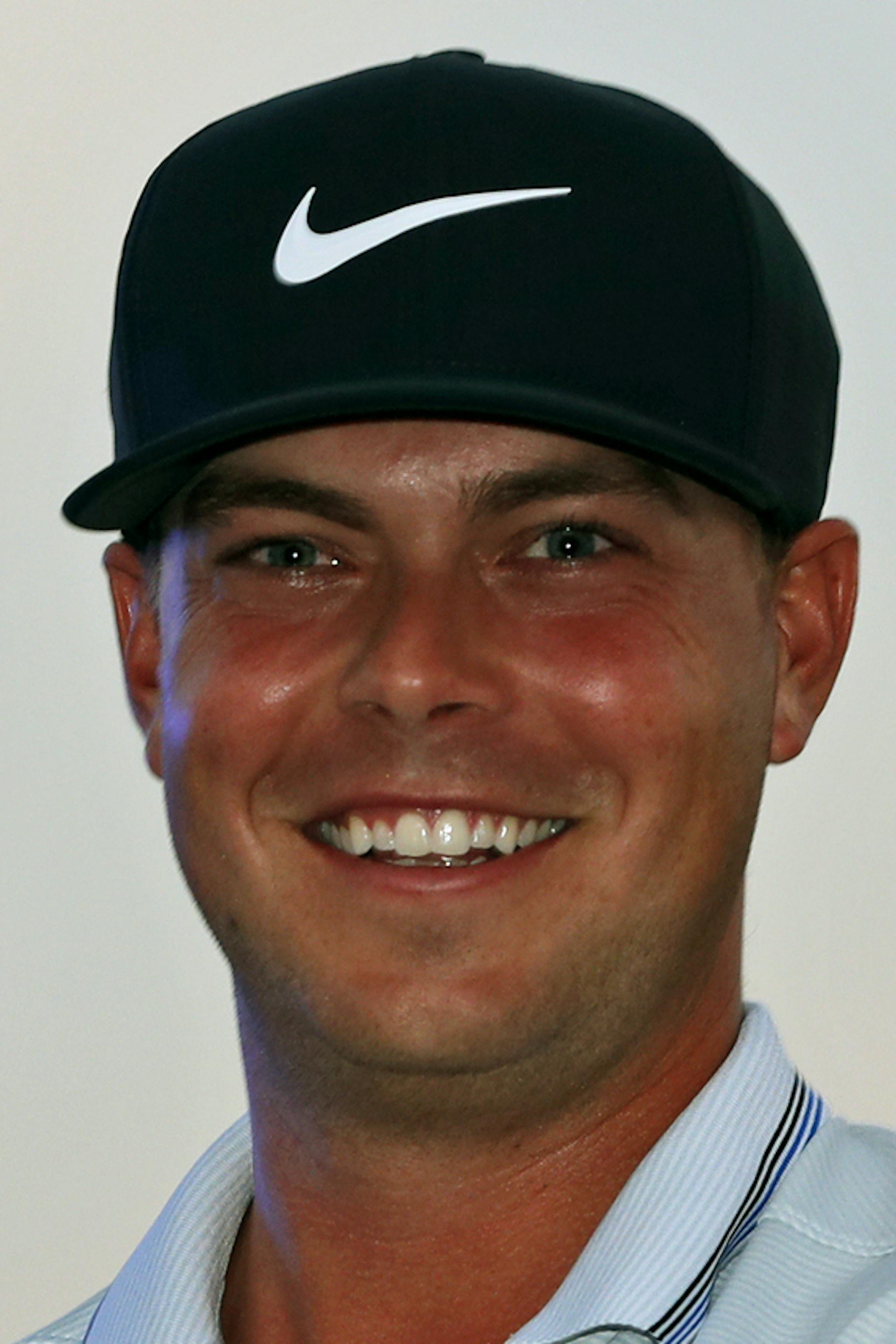 Keith Mitchell holds up his trophy after winning the Honda Classic golf tournament Sunday, March 3, 2019, in Palm Beach Gardens, Fla. (AP Photo/Wilfredo Lee)