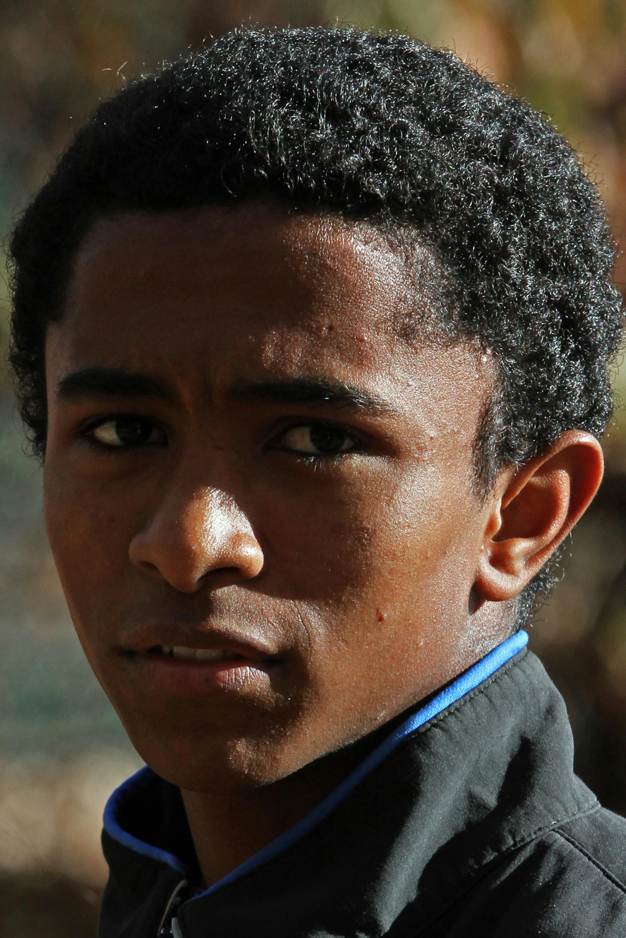 Ephraim Bird lined-up with the Minnehaha Academy Cross Country team before practice on 10/11/12. Ephraim Bird does not attend Minnehaha Academy. The 5-4, 105-pound sophomore, who was adopted from Ethiopia when he was 13, attends tiny Hope Academy in Minneapolis, which does not have a cross-country team. Bird reluctantly became a runner this summer and has shown remarkable potential, already having won two races. He races as a team of one, with his father Jeff as his coach, because it was too lat