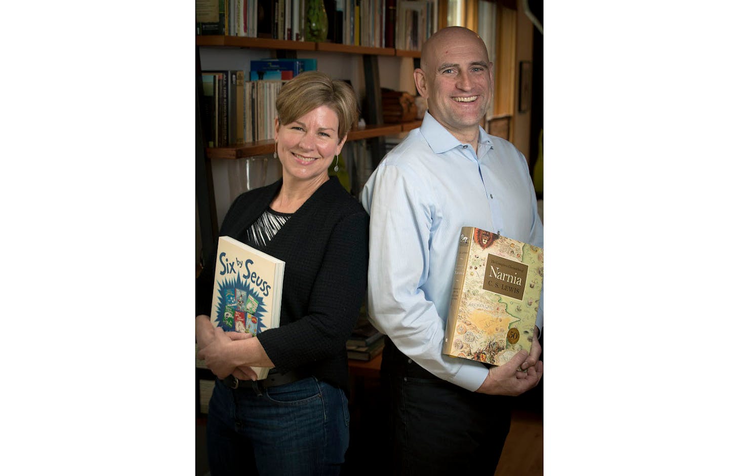 Kevin Terrell, right, and co-founder Pam Longfellow, left, of "Start Reading Now," at his home, Friday, May 19, 2017 in Minneapolis, MN. Starting June 5, on the eve of summer vacation, Terrells fledging nonprofit "Start Reading Now" will give away 40,000 new books to 4,000 Minneapolis first and second graders. Terrell, a self-confessed public policy wonk and former Independent candidate for U.S. Senate in 2014, said he decided to start the nonprofit when he found research that determined simply