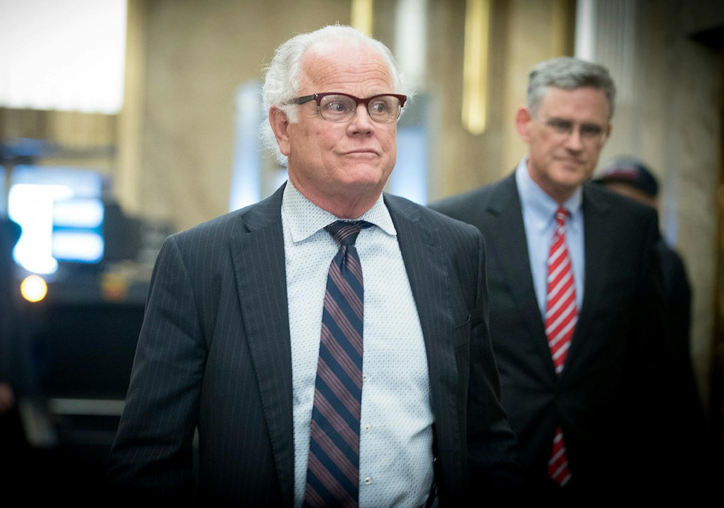 Officer Jeronimo Yanez's attorneys Earl Gray, left, and Paul Engh made their way out of a courtroom after Yanez appeared in court Tuesday in St. Paul for a pretrial hearing in preparation for his May 30 trial in the fatal shooting of Philando Castile.