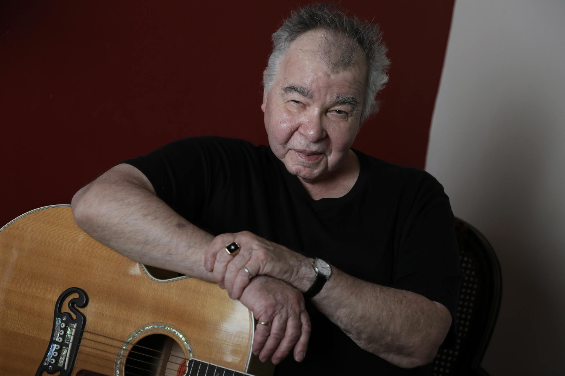 In this June 20, 2017, photo, John Prine poses in his offices in Nashville, Tenn. (AP Photo/Mark Humphrey) ORG XMIT: TNMH1