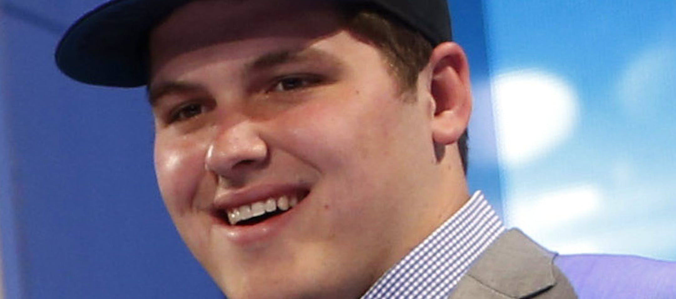 Luke Joeckel, from Texas A&M, stands with NFL Commissioner Roger Goodell after being selected second overall by the Jacksonville Jaguars in the first round of the NFL football draft, Thursday, April 25, 2013, at Radio City Music Hall in New York. (AP Photo/Jason DeCrow)