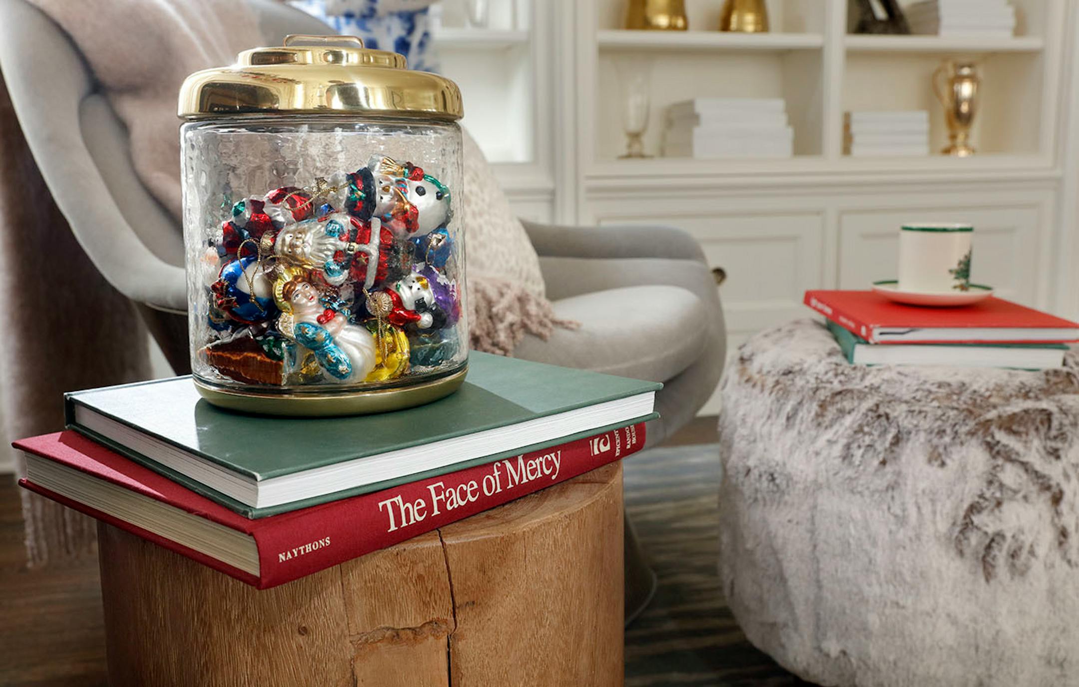 Display a favorite ornament collection inside a clear apothecary jar.