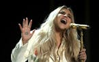 Kesha performed "Praying" at the Grammy Awards earlier this year.