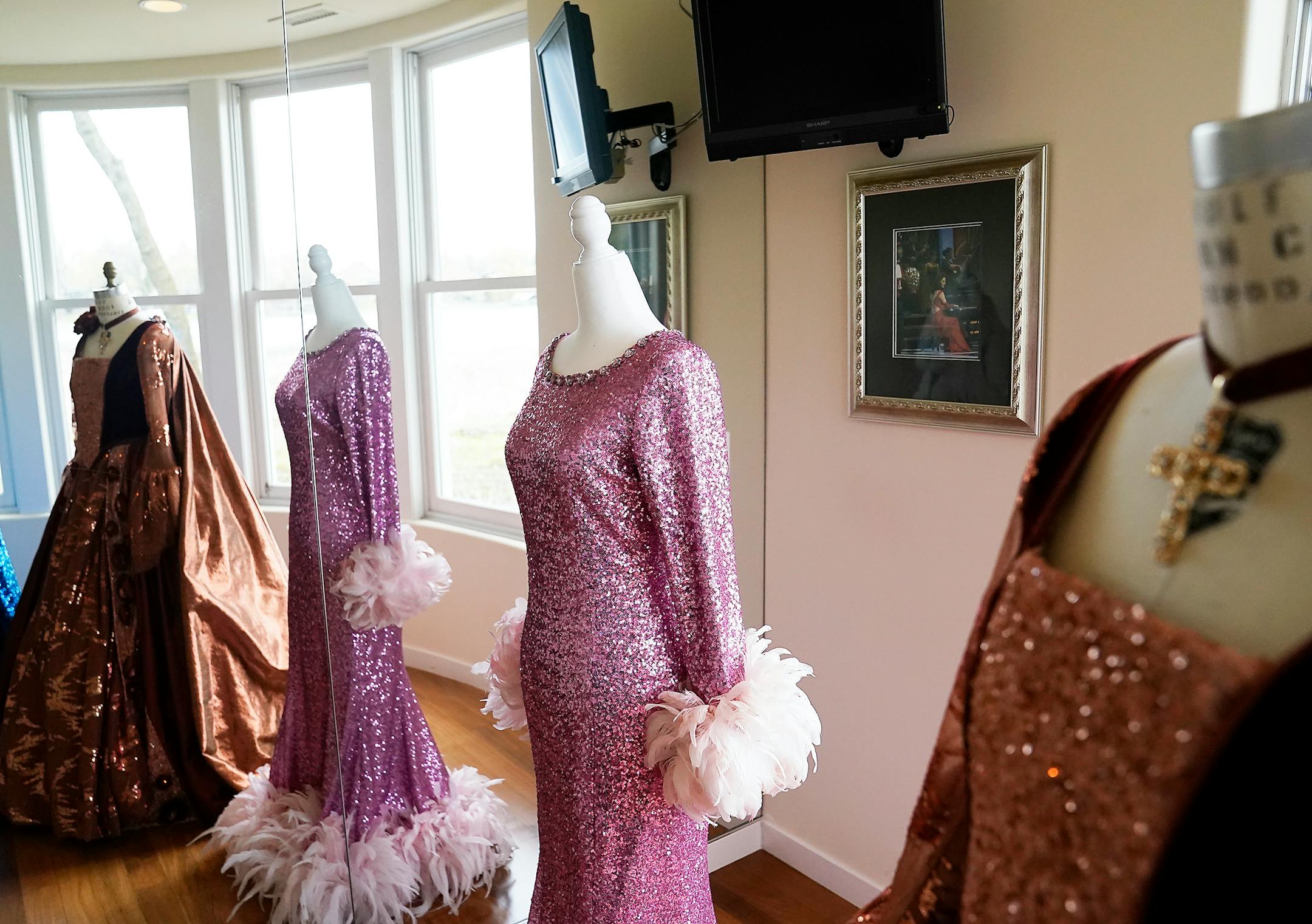 Lorie Line displays five costumes at a time in the lower level.