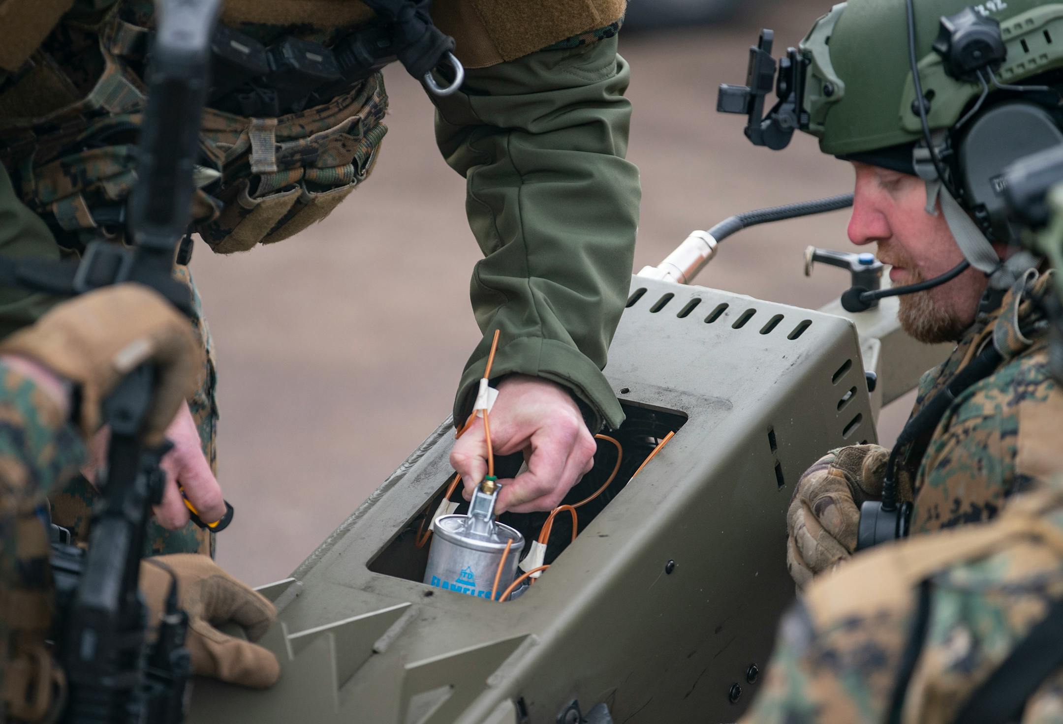 Canisters of flameless tri-chamber CS were loaded into a device that launches them from the end of the Sheriff department's armored vehicle.