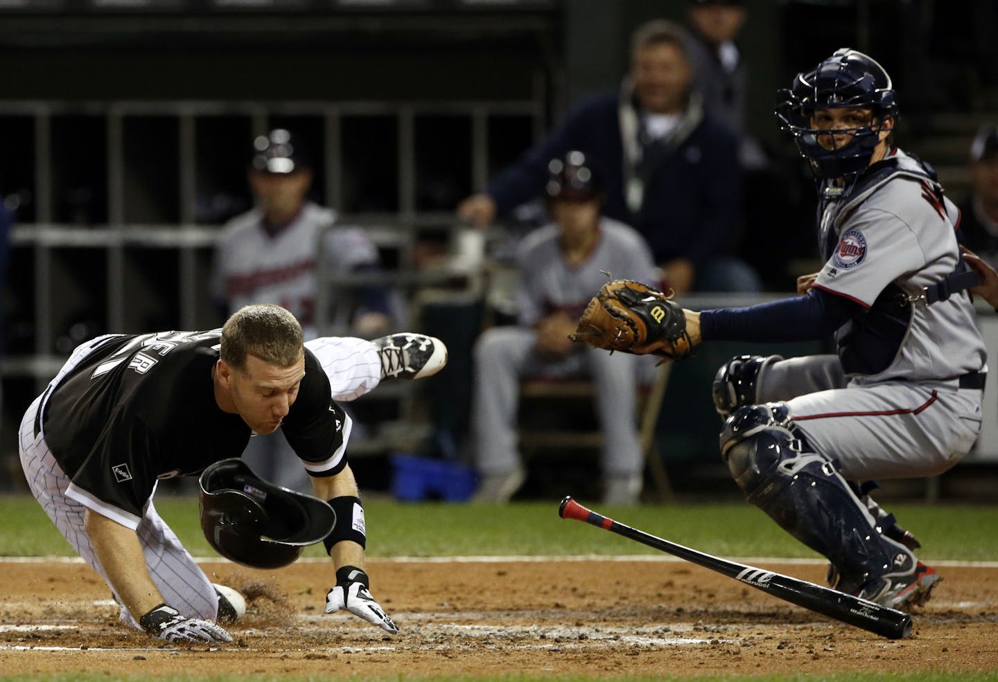 Chicago White Sox's Todd Frazier, left, gets out of the way of an inside pitch as Minnesota Twins catcher John Murphy looks on during the first inning of a baseball game Friday, Sept. 30, 2016, in Chicago. (AP Photo/Nam Y. Huh)