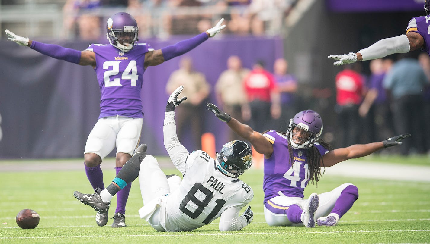 There were no penalties involved on this play when Vikings safety Anthony Harris, right, and cornerback Horace Richardson broke up a pass intended for Jacksonville tight end Niles Paul during Saturday's preseason game at U.S. Bank Stadium, but the new player safety rules are proving hard to interpret.