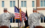 In this file photo, generals salute during an installation ceremony at the U.S Army Forces Command at Fort Bragg, N.C., one the Army's three major com
