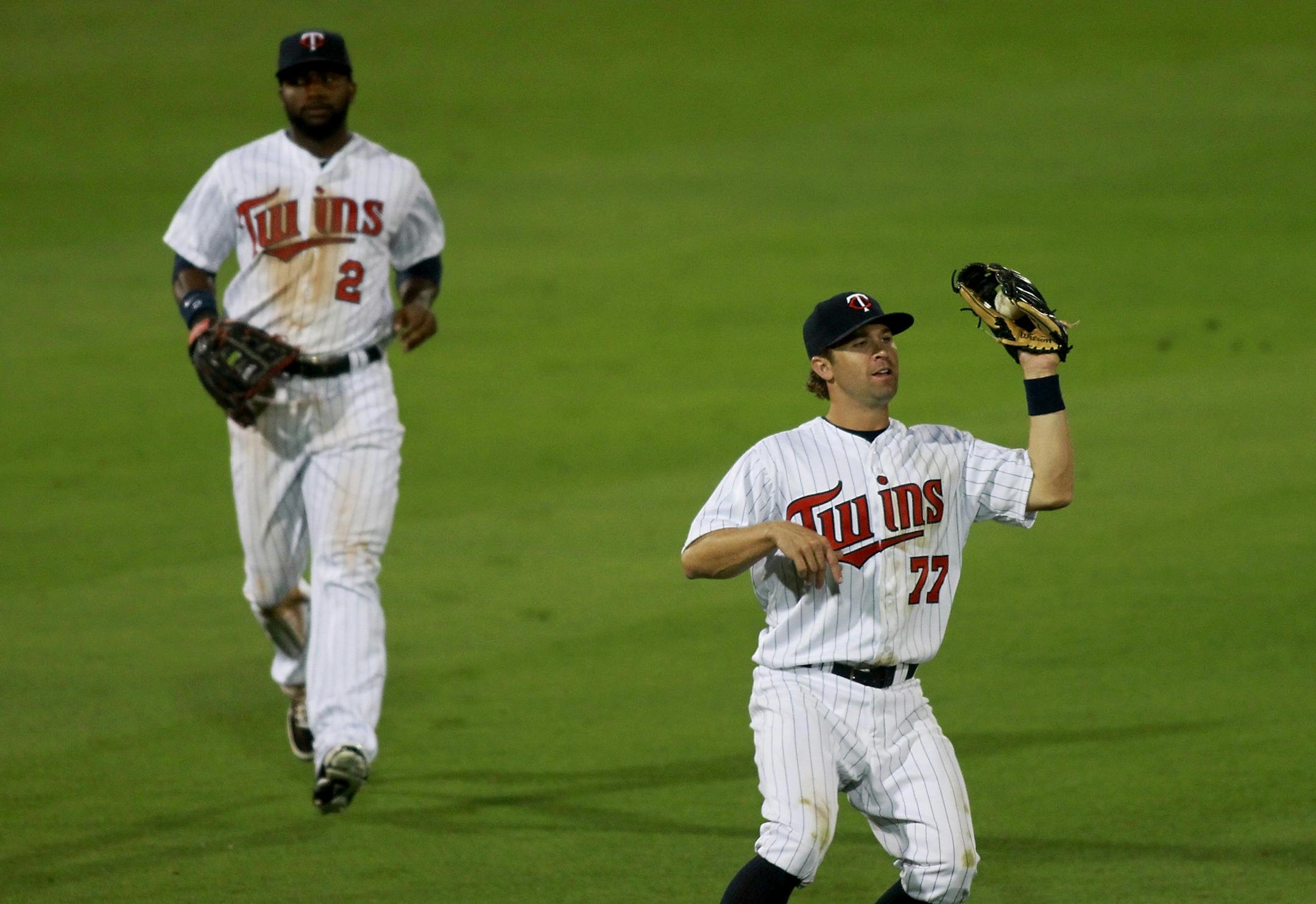 Minnesota Twins Brian Dozier made a grab in the fifth inning, Monday, March 5, 2012 in Ft. Myers, FL. (ELIZABETH FLORES/STAR TRIBUNE) ELIZABETH FLORES � eflores@startribune.com
