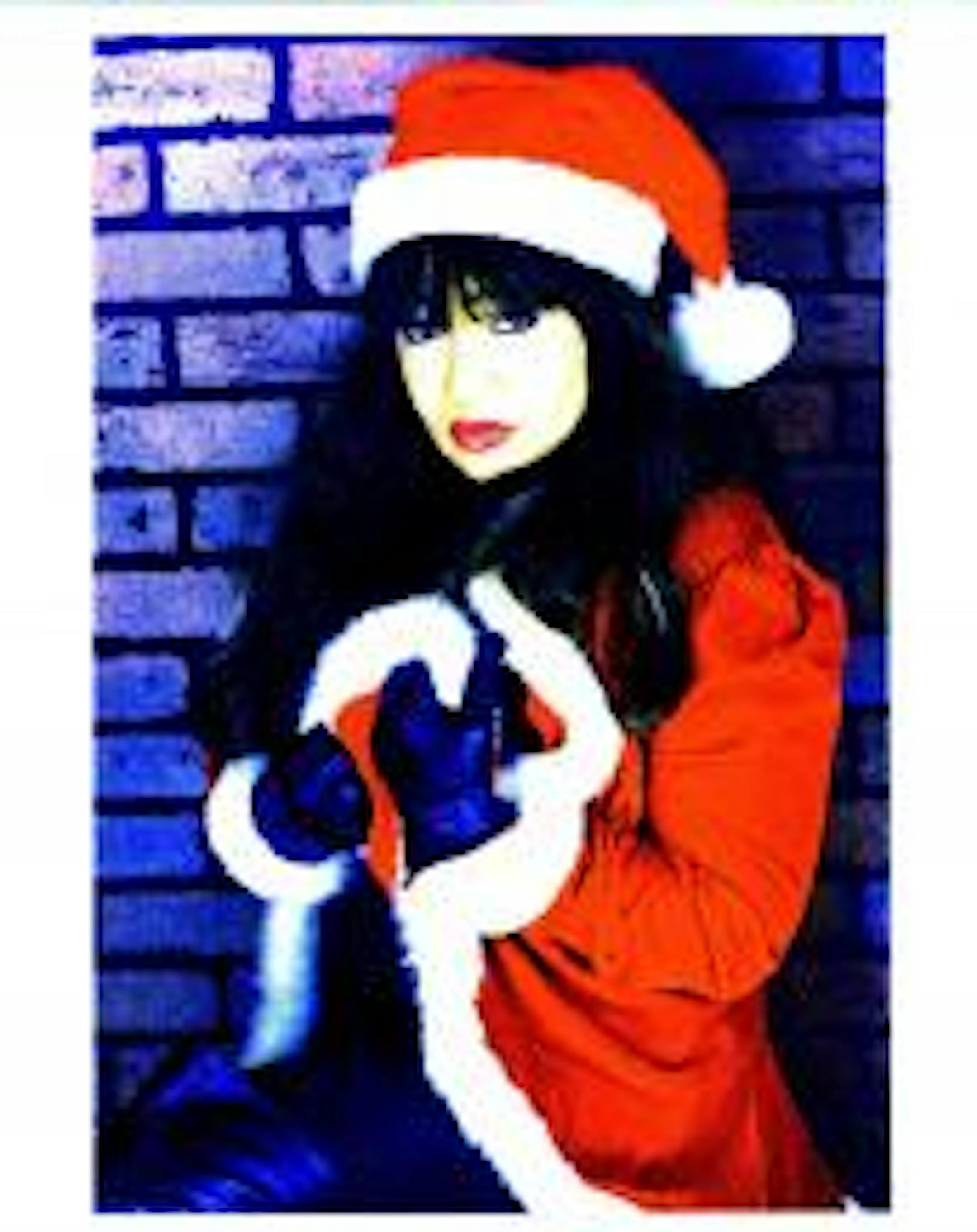 Ronnie Spector wore the coat but not the cap at the Dakota