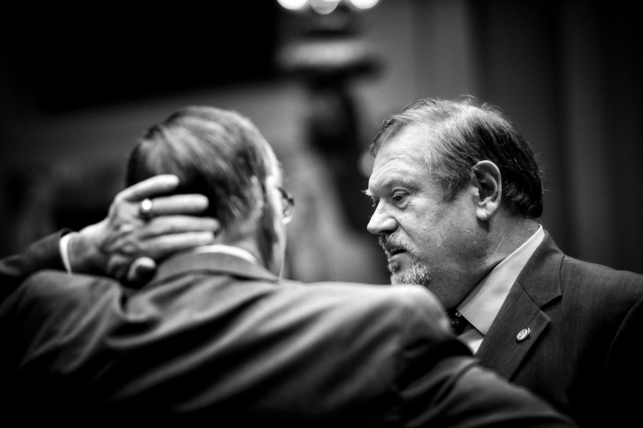 Senate Majority Leader Tom Bakk talked with former Majority Leader Sen. David Senjem R-Rochester, on the mostly empty Senate floor before the start of the day's session. ] GLEN STUBBE * gstubbe@startribune.com Monday, March 31, 2014.