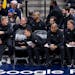 Chris Finch gives instructions during Game 1 against Denver from his chair in the second row behind the Timberwolves bench. "It worked out better than