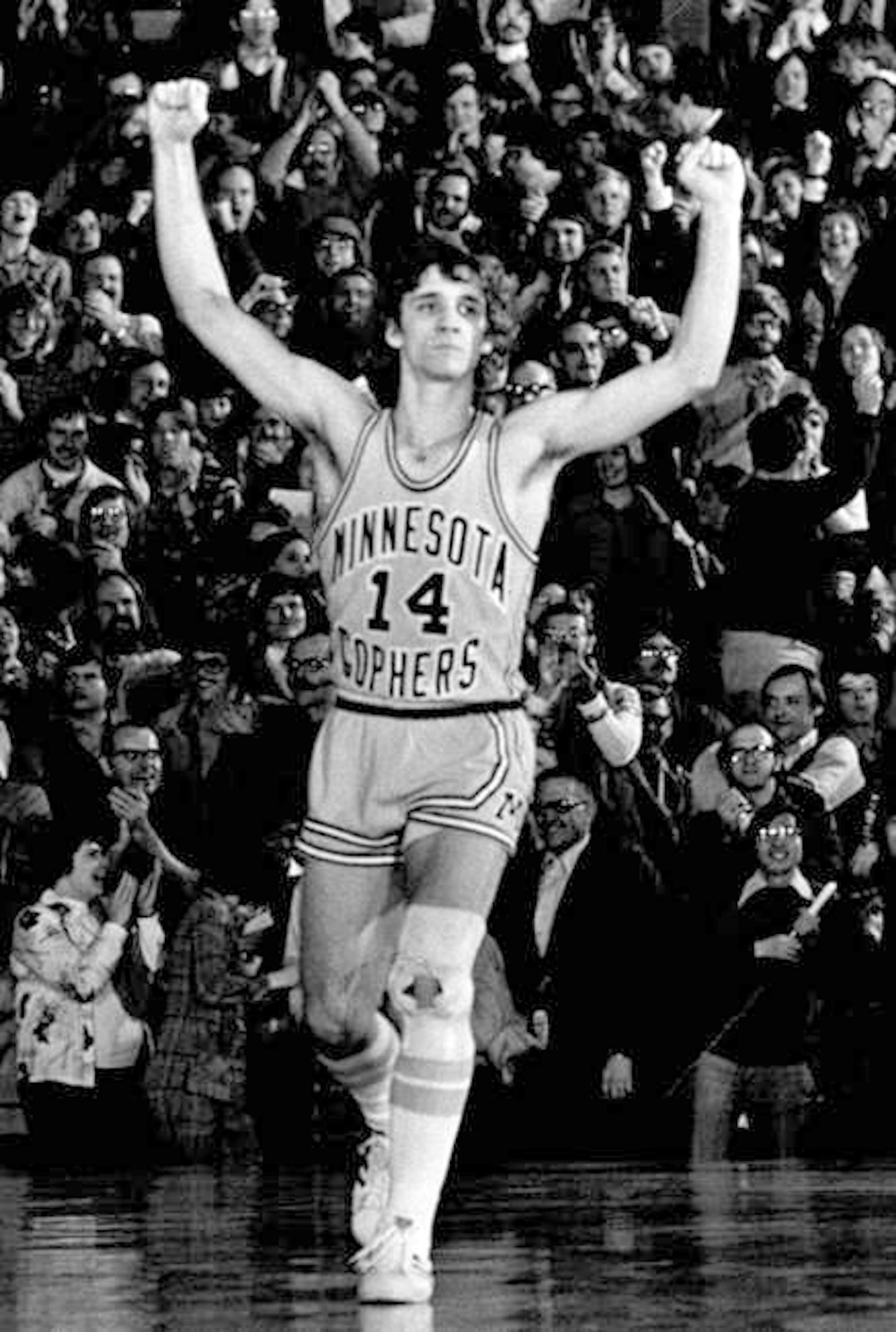 Minnesota Gopher, Flip Saunders celebrates during one of his games played as a gopher.