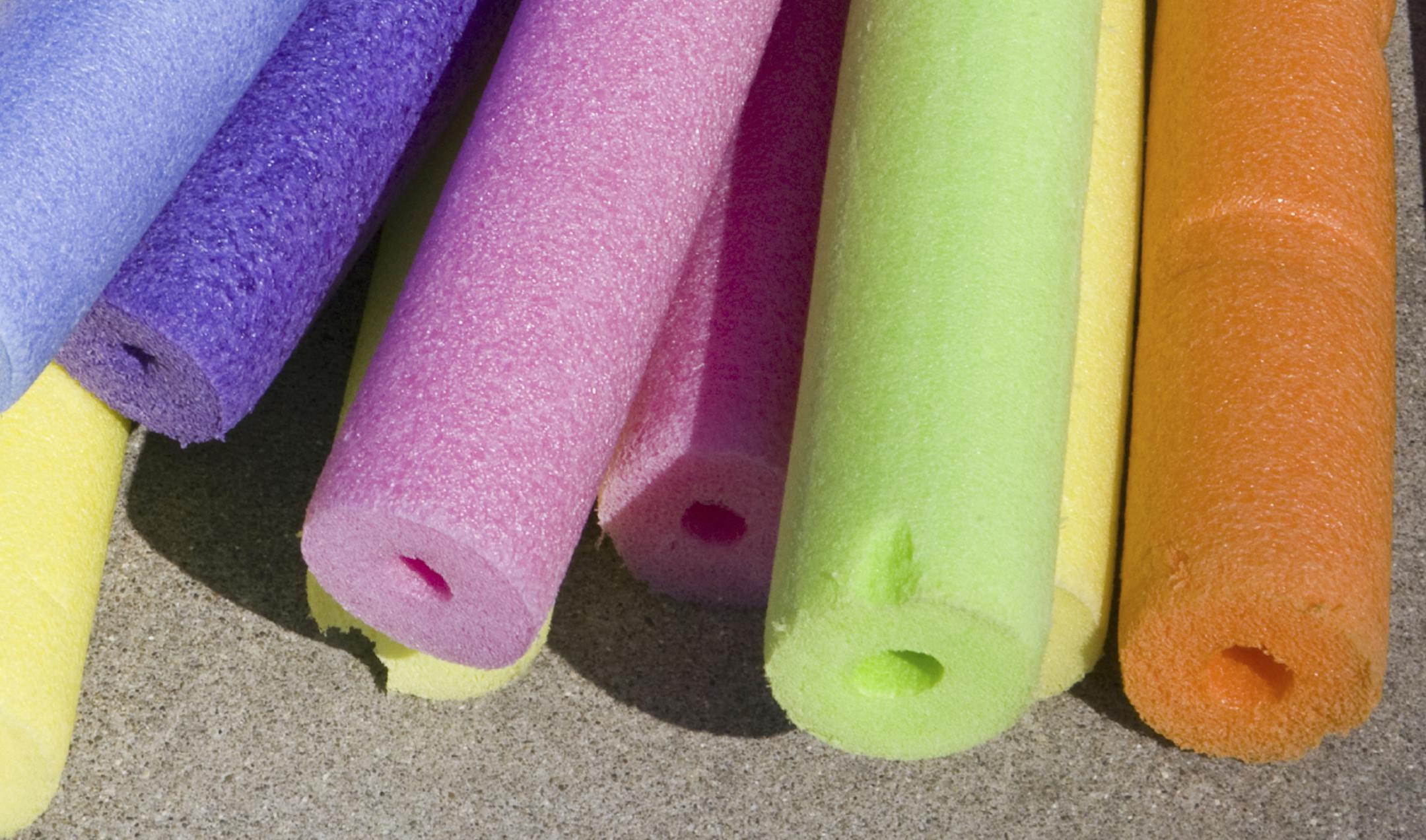 multicolored swimming pool noodles