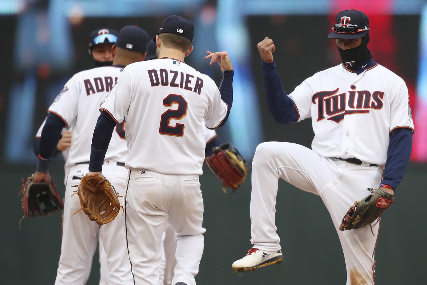 Twins second baseman Brian Dozier (2) and center fielder Byron Buxton, right, celebrated the Twins win at the end of their home opener. ] JEFF WHEELER &#xef; jeff.wheeler@startribune.com The Minnesota Twins beat the Seattle Mariners 4-2 in their home opener Thursday afternoon, April 5, 2018 at Target Field in Minneapolis.