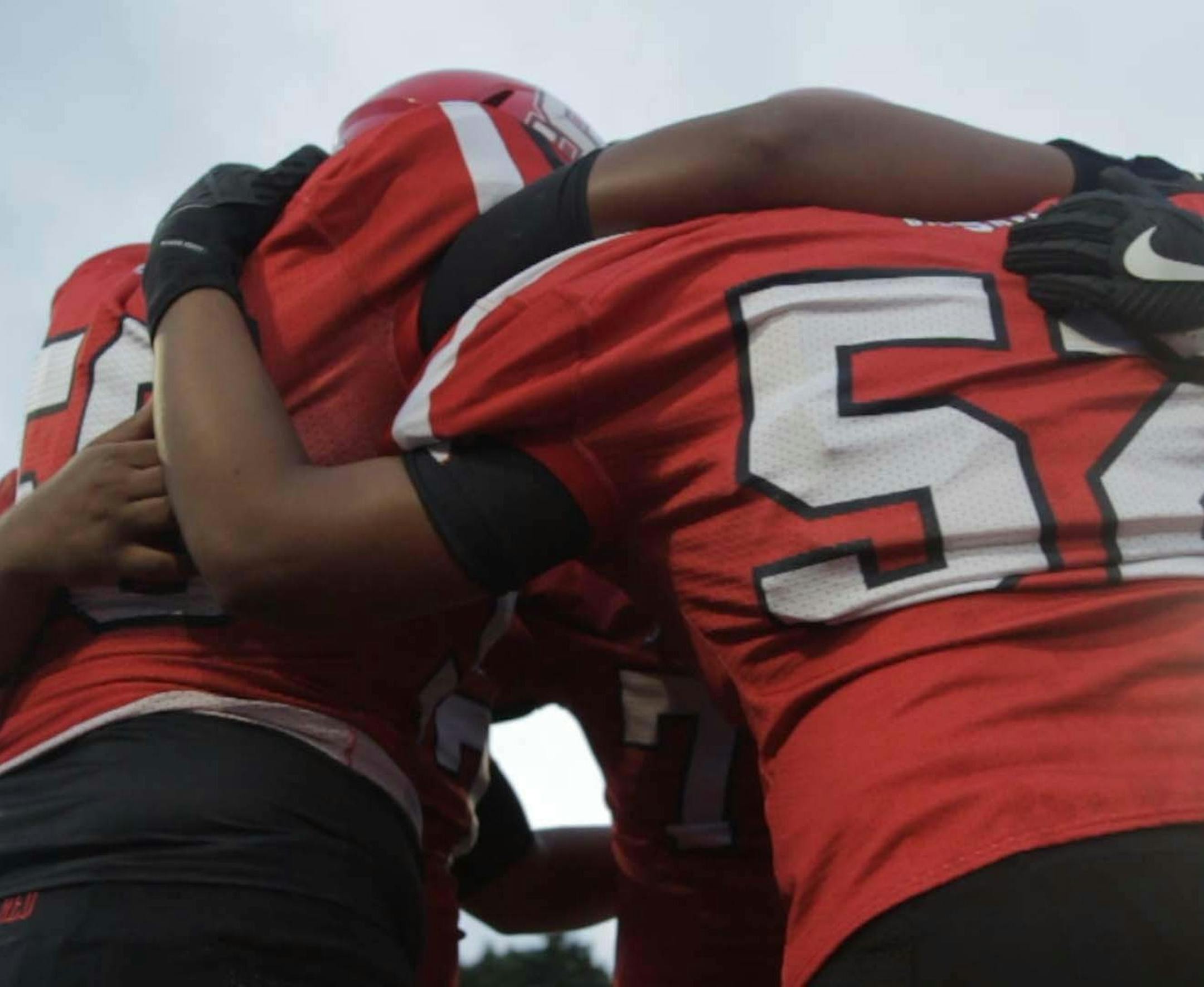 Members of the Steubenville, Ohio, High School football team in "Roll Red Roll."