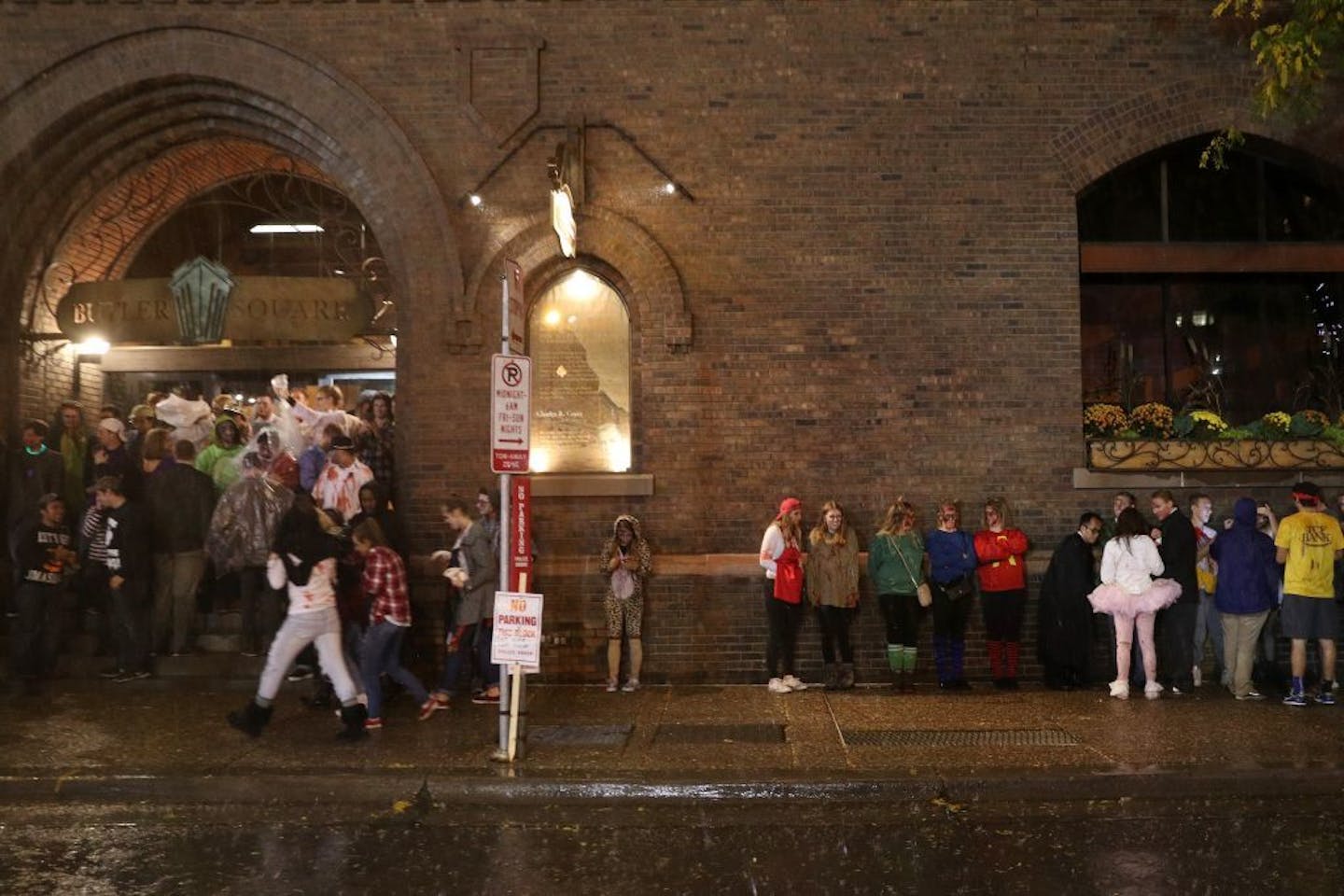 Zombies took cover against buildings as the rain picked up Saturday night.