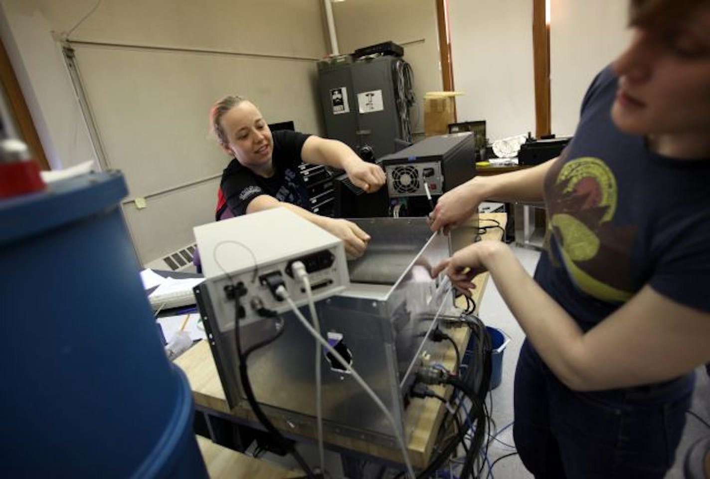 Kathleen Dewahl, left, and Megan Krejny created an imaging polarimeter with U of M Prof. Terry Jones. "When I was a student, there were zero women," Jones said of the astronomy department.