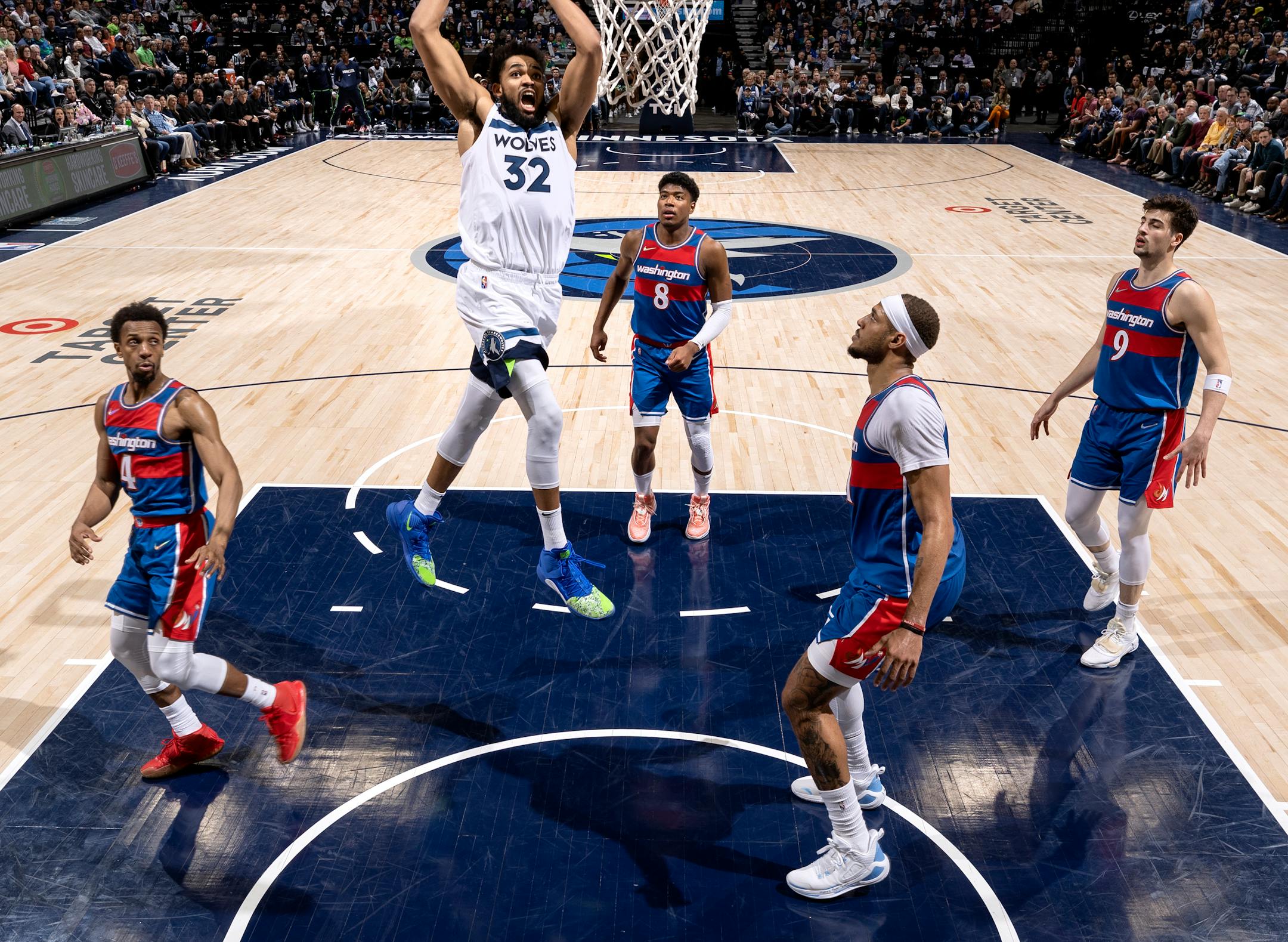 Karl Anthony-Towns (32) of the Minnesota Timberwolves goes up for a dunk in the second half.