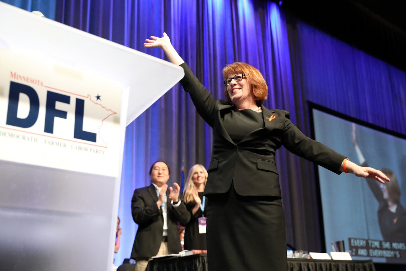 Rep. Erin Murphy smiled on stage after it was announced that the other candidates for governor were dropping out of the endorsement process at the DFL State Convention in Rochester on Saturday.