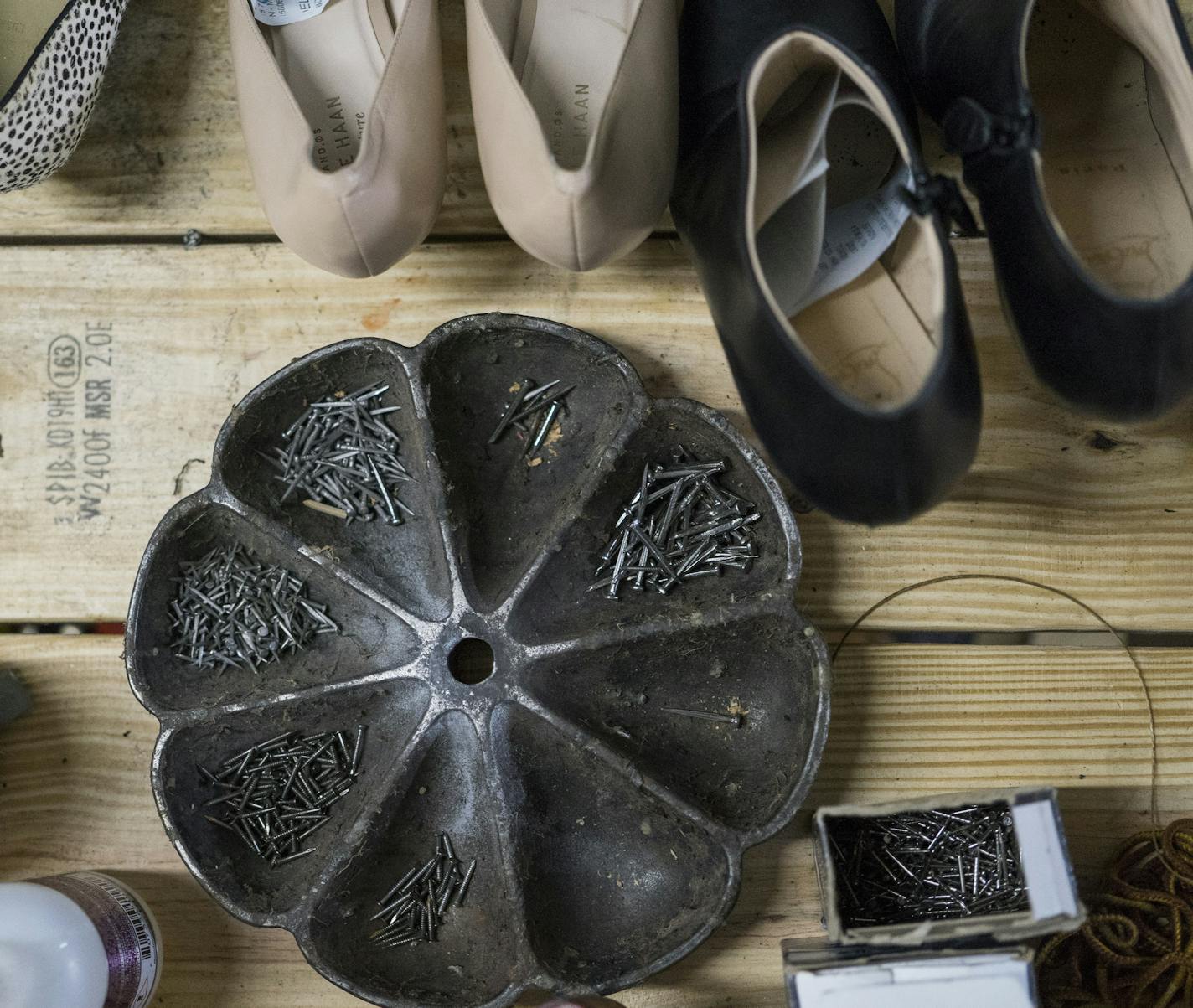 Cobbling supplies sit on a table with shoes ready for repair.]
TONY SAUNDERS &#xb0; anthony.saunders@startribune.com on Friday, April 12, 2019 at Shooli, a startup door-to-door shoe shine and repair service in Minneapolis, Minn.