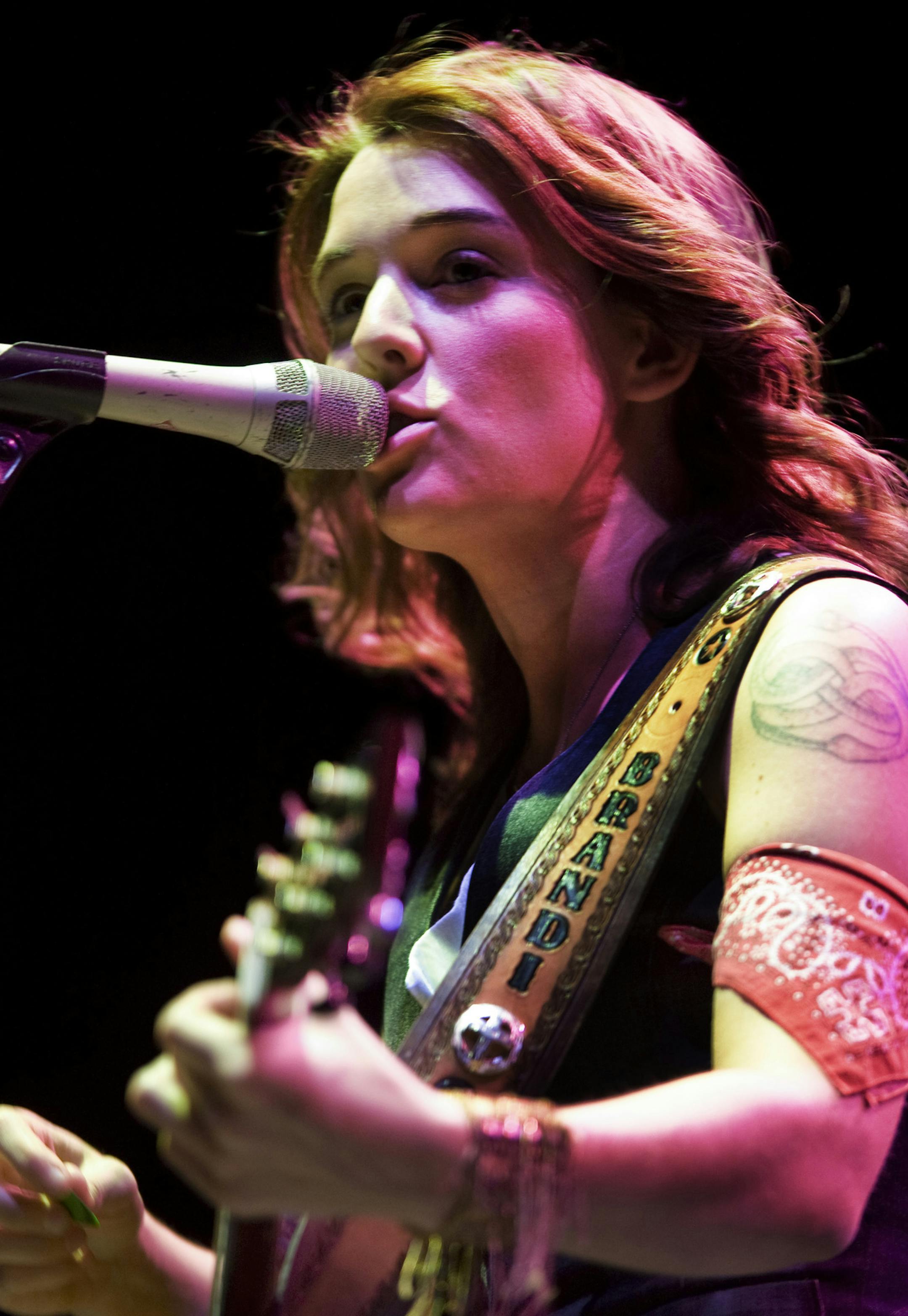 DAVID BREWSTER ‚Ä¢ dbrewster@startribune.com Sunday 08/29/10 State Fair (Falcon Heights) GRANDSTAND PERFORMANCE / REVIEW OF BRANDI CARLILE ] Brandi Carlile performing Sunday night at the State Fair Grandstand. ORG XMIT: MIN2013060412000155